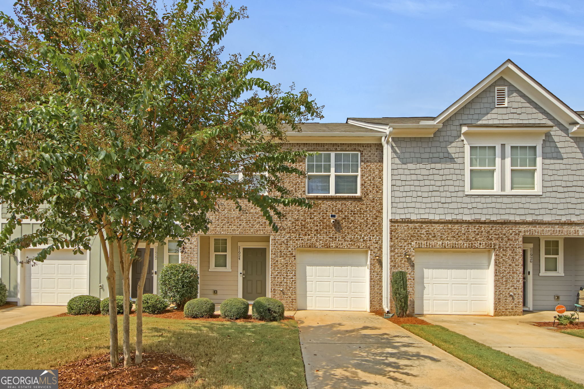 Brand new construction feel without the brand new prices. Save some money on this beautifully updated townhome featuring a desirable roommate floor plan. Each spacious bedroom offers its own private bathroom for added comfort and convenience. The home has been refreshed with new flooring and boasts granite countertops in the kitchen for a modern touch. Located in a well-managed community with an affordable HOA, this property offers peace of mind and easy living. Enjoy being just minutes from Hartsfield-Jackson Atlanta International Airport, with plenty of shopping, dining, and entertainment nearby. Perfect for homeowners or investors alike!