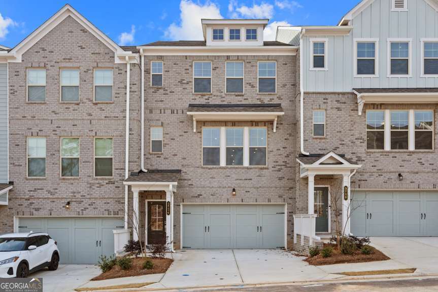 MLS#10459860 New Construction - Ready Now! Welcome to the Sierra at Hampton Trace! This townhome combines spacious design with thoughtful functionality to suit any lifestyle. The lower level includes a private bedroom with an ensuite bathroom and direct backyard accessCoperfect for guests or a home office. The modern kitchen flows effortlessly into the dining area and gathering room, complete with a convenient half bath nearby. Upstairs, the primary suite is a true retreat, boasting a luxurious bathroom with a dual-sink vanity, walk-in shower, and stylish finishes, along with an oversized closet. Two secondary bedrooms and an upstairs laundry room add even more convenience to this well-designed home. Design features added include: white cabinets and upgrade LVP flooring.