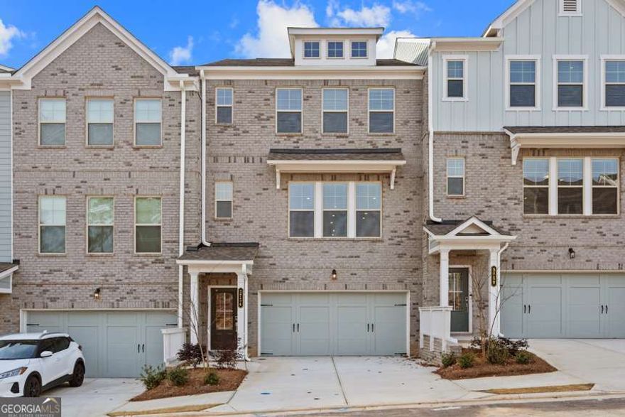 MLS#10459860 New Construction - Ready Now! Welcome to the Sierra at Hampton Trace! This townhome combines spacious design with thoughtful functionality to suit any lifestyle. The lower level includes a private bedroom with an ensuite bathroom and direct backyard accessCoperfect for guests or a home office. The modern kitchen flows effortlessly into the dining area and gathering room, complete with a convenient half bath nearby. Upstairs, the primary suite is a true retreat, boasting a luxurious bathroom with a dual-sink vanity, walk-in shower, and stylish finishes, along with an oversized closet. Two secondary bedrooms and an upstairs laundry room add even more convenience to this well-designed home. Design features added include: white cabinets and upgrade LVP flooring.