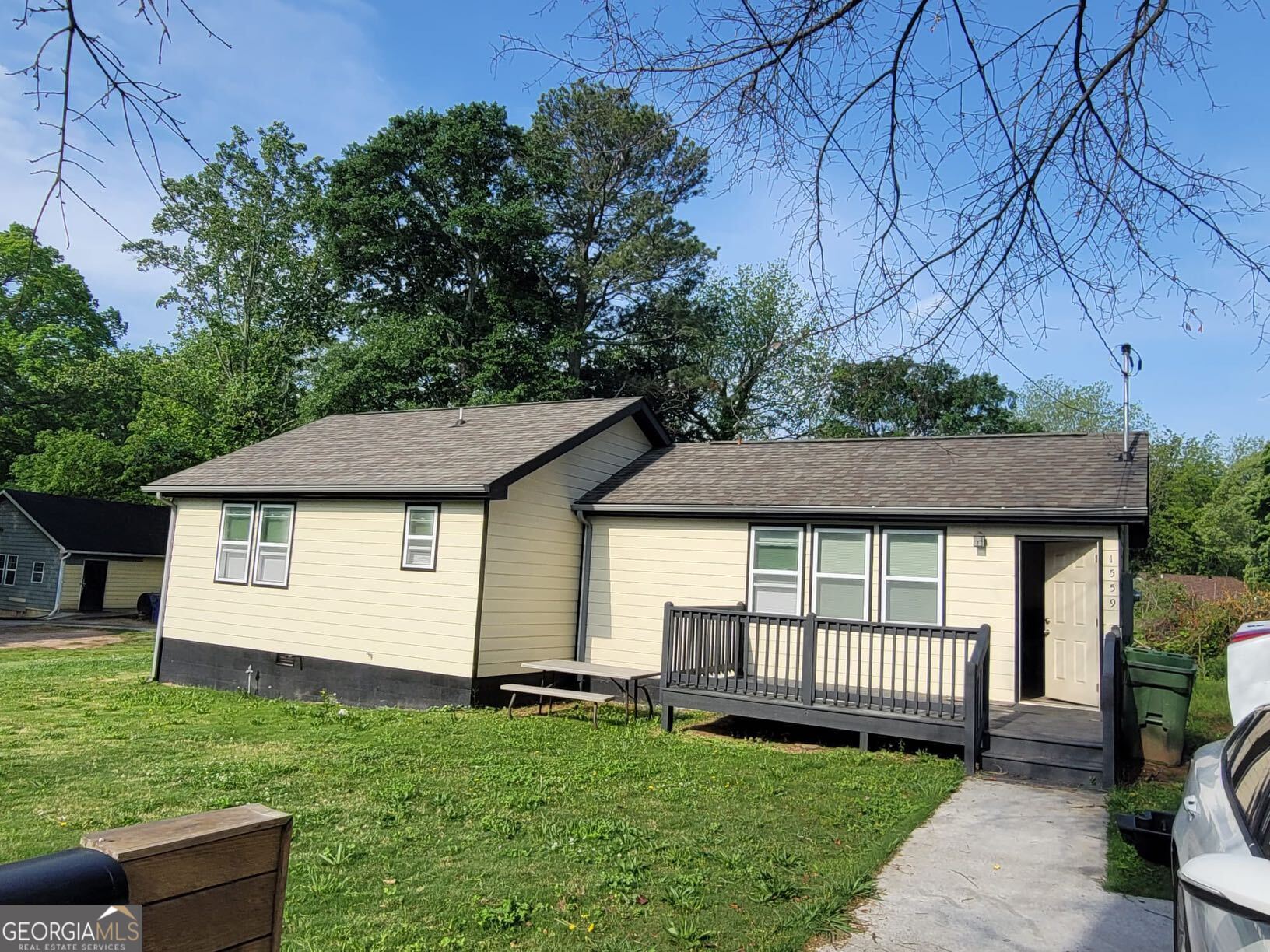 Don't miss this beautifully renovated gem, ideally located just minutes from the interstate and Oakland City MARTA station, and within walking distance of the upcoming bus rapid transit line on Campbellton Rd. Inside, rich hardwood floors flow throughout, complementing the tastefully updated bathrooms and a stylish kitchen with granite countertops. The expansive new front porch offers plenty of space for seating-perfect for unwinding and enjoying the outdoors.