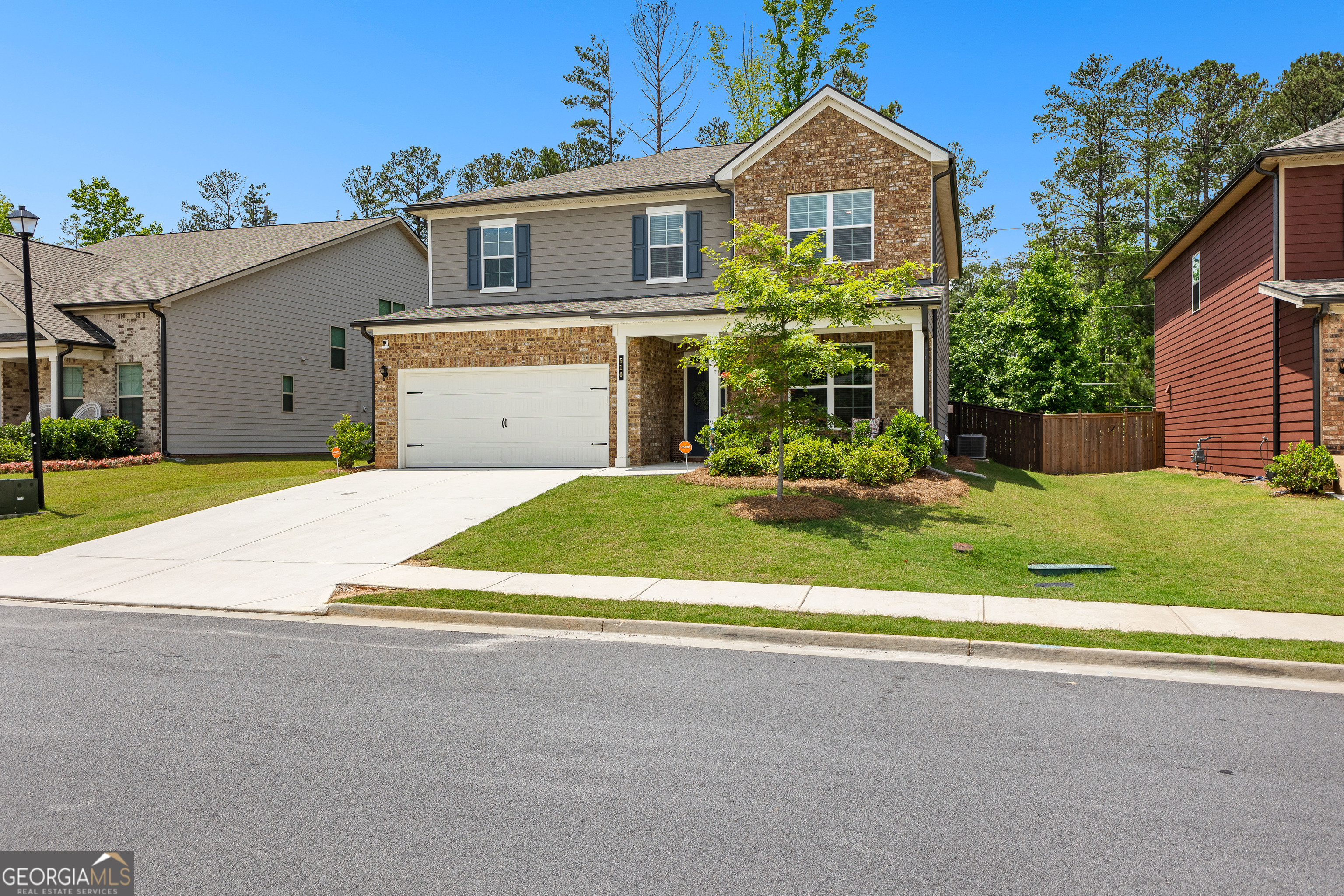 Let the front door swing open from your rocking-chair front porch and instantly feel that "it's good to be home" comfort. Inside, the first floor features a spacious kitchen with a clear view of the open dining and living areas-perfect for cooking, entertaining, or keeping an eye on the action. A walk-in pantry, convenient drop zone, full guest suite, and an extended patio leading to the fenced backyard make everyday living both functional and fun. Upstairs, 3 secondary bedrooms share a full bath, and the versatile loft offers endless options, whether you envision a cozy playroom, teen hangout, home office, workout space...you name it! Tucked away for privacy, the primary suite offers a clean, fully tiled bath and an impressive walk-in closet. Oh! Don't miss the extra golf cart parking in the garage. The additional tandem space is ideal for a golf cart, workshop setup, or bonus storage. Come and see this wonderful home for yourself; we'd love to show you around and make it yours!