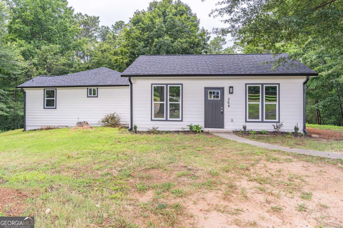 Welcome to 364 Aldene Court- A Beautifully Updated Home in a Prime Location! Tucked away on a peaceful cul-de-sac in the heart of Woodstock, this charming home offers the perfect combination of modern updates, comfortable living, and unbeatable convenience. Boasting 3 spacious bedrooms and 2 bathrooms, this property has been thoughtfully updated and is move-in ready. Step inside to discover a bright, open-concept living space with new LVP flooring, fresh paint throughout, and stylish lighting fixtures. The updated kitchen features new cabinets, granite countertops, new stainless steel appliances, and an open floor plan with a view to the cozy family room-ideal for both everyday living and entertaining. This open layout provides plenty of space for guests and family. The large primary suite offers a relaxing retreat with a beautifully renovated en-suite bathroom. Primary bath has dual sink vanity, custom tiled shower, and tiled floor. Two additional bedrooms share the updated full bath with tiled tub/shower combo and new vanity and toilet. Outside, enjoy your private backyard-perfect for pets, gardening, or summer barbecues. This perfect location is just minutes from downtown Woodstock, one of Georgia's most vibrant small towns! You'll have access to award-winning restaurants, boutique shopping, farmers markets, live music, and events year-round. Easy access to I-575, Top-Rated Cherokee County Schools, parks, and walking trails makes this location ideal for commuters and families alike. Option to join the Riverside community which offers fun events like Easter egg hunt, pool parties, 4th of July fireworks, food trucks in addition to swim/tennis. Don't miss your opportunity to own a turnkey home in one of Woodstock's most desirable areas.