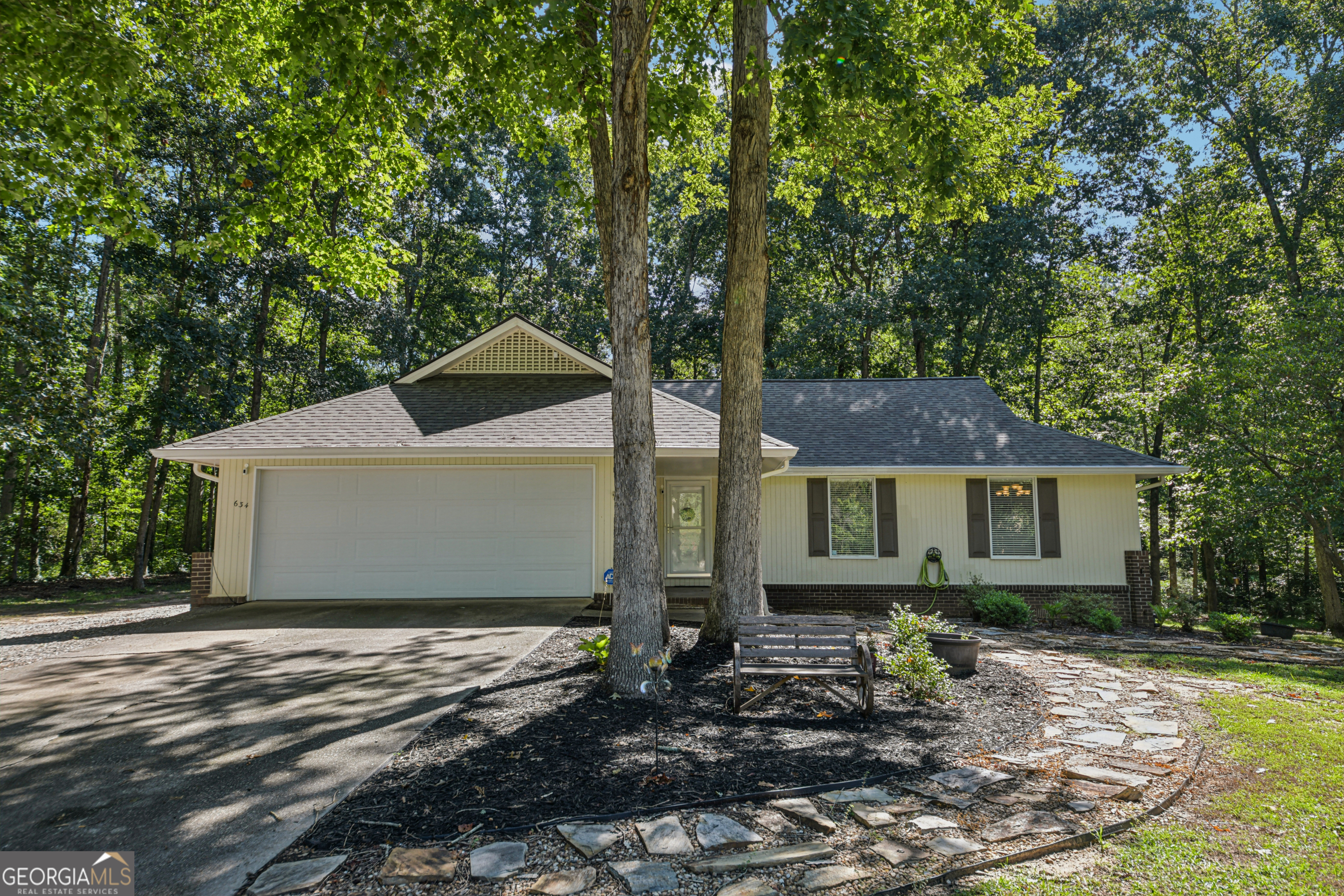 Welcome home to this beautifully upgraded ranch-style retreat tucked in a peaceful cul-de-sac! This charming home features new flooring, soaring ceilings, and a spacious family room filled with natural light - perfect for everyday living and entertaining. Step outside to your private backyard oasis complete with a firepit, chairs, and ambient night lighting - all of which stay with the home! Enjoy added peace of mind with a Ring camera system and exterior house lighting for curb appeal and security. Located in a quiet neighborhood with an optional HOA, this home offers flexibility, privacy, and comfort all in one.