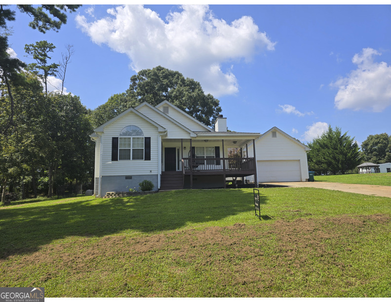 This awesome 3 br./2BA ranches right over the banks County line and close to Banks Crossingwhich offers restaurants, shopping and more. The open floor plan features a spacious Living Room with stone fireplace, dining area and kitchen with breakfast bar, great for family and friends. The Owners Suite includes double closets, double sinks and vanity and garden tub. Like to entertain outdoors? Besides a large wraparound front porch,a screened in porch, back deck and a large backyard fenced and non fenced areas.