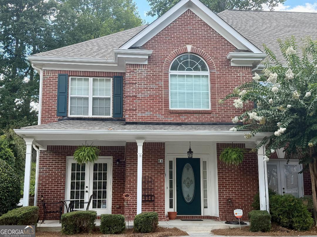 Live the Lake Lanier lifestyle within the highly rated Buford City School district! Nestled in a quiet, beautifully kept neighborhood, this well-maintained home shines with a bright, open floor plan. Hardwood floors throughout on main level and new carpeting upstairs. Kitchen upgrades include a gas stove, granite countertops, remodeled tile backsplash and wide profile microwave. Remote starter gas fireplace. Exterior light fixtures upgraded July 2025. The neighborhood includes a private pool. Swim, fish or relax at the community dock (installed August 2024). Convenient boat dock at the end of the street. New roofing and gutters (August 2024). Close to downtown Buford and within walking distance to Lake Lanier. Enjoy the perfect blend of lakeside serenity, modern amenities, and top-rated schools. Schedule your tour today and start living the lake life you have always dreamed of. Please request appointments on Showing Time-owner occupied.