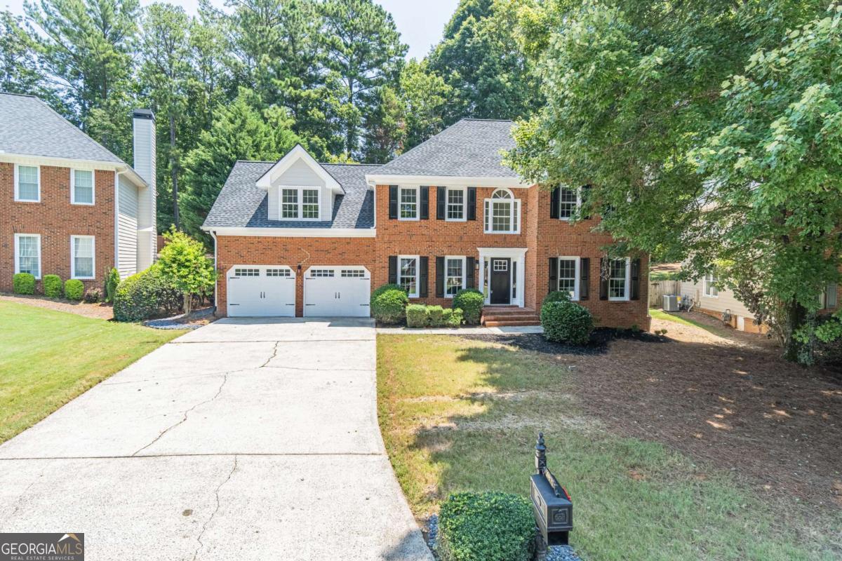 Welcome home to this charming 4-bedroom, 2.5-bathroom residence located in one of Alpharetta's most desirable family neighborhoods! With fresh paint, new flooring, new lighting, and updated windows, this home is move-in ready and perfect for a growing family. The updated kitchen features brand new stainless steel appliances and granite countertops, ideal for preparing meals while staying connected to the heart of the home. An eat in area is perfect for your morning coffee! Generous living and dining areas provide the perfect setting for family game nights, homework time, or relaxed evenings by the fireplace in the adjoining family room. A deck is located just off the kitchen and makes outdoor entertaining a breeze! Upstairs, you'll find four well-sized bedrooms including a serene primary suite, perfect for parents seeking a quiet retreat. Soak your troubles away in the freestanding soaking tub! A custom tiled shower will make you feel like your in your own private spa. Set in a welcoming swim/tennis community, your family will enjoy access to the neighborhood pool and tennis courts-perfect for weekend fun and making lifelong friends. Located just minutes from Avalon and the restaurants and shops of downtown Alpharetta, and some of North Fulton's top-rated public schools, this home offers unbeatable convenience for busy families. Close to 400, Avalon, Halcyon, Roswell. Your buyers will love this move-in ready home. Don't miss this opportunity to settle into a safe, community-focused neighborhood with everything your family needs-right at your doorstep!