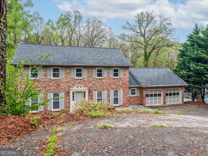 Welcome to this beautifully maintained 4-bedroom, 2.5-bath home in the heart of East CobbCOs highly sought-after Walton High School district. Step into a grand foyer flanked by a formal dining room and a light-filled sitting roomCoperfect for entertaining or quiet evenings at home. The sitting room flows effortlessly into the cozy fireside family room, complete with bay windows, built-in bookcases, and direct access to a stunning sunroom with vaulted ceilings and walls of windows. The kitchen is a chefCOs delight, featuring stone countertops, updated appliances, a breakfast bar, and a bright breakfast nook. A spacious laundry room and a powder room complete the main level. Upstairs, retreat to the serene primary suite with a spa-like ensuite bathroom showcasing a sleek glass-enclosed shower. Three additional generously sized bedrooms share a full bath, ideal for family or guests. The full, unfinished basement offers incredible storage or future expansion potential, with walk-out access to the backyard. Step outside to enjoy your own private oasisCoan expansive open deck, a shaded patio, and a sparkling in-ground saltwater pool ready for summer fun. Additional features include an attached 2-car garage and an unbeatable location close to Downtown Roswell, the Chattahoochee River, top shopping and dining destinations, and major highways. DonCOt miss your chance to make this incredible East Cobb gem your next home!