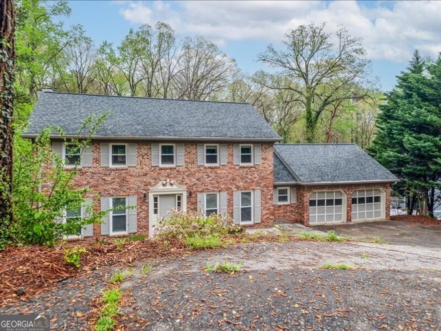 Welcome to this beautifully maintained 4-bedroom, 2.5-bath home in the heart of East CobbCOs highly sought-after Walton High School district. Step into a grand foyer flanked by a formal dining room and a light-filled sitting roomCoperfect for entertaining or quiet evenings at home. The sitting room flows effortlessly into the cozy fireside family room, complete with bay windows, built-in bookcases, and direct access to a stunning sunroom with vaulted ceilings and walls of windows.  The kitchen is a chefCOs delight, featuring stone countertops, updated appliances, a breakfast bar, and a bright breakfast nook. A spacious laundry room and a powder room complete the main level.  Upstairs, retreat to the serene primary suite with a spa-like ensuite bathroom showcasing a sleek glass-enclosed shower. Three additional generously sized bedrooms share a full bath, ideal for family or guests.  The full, unfinished basement offers incredible storage or future expansion potential, with walk-out access to the backyard. Step outside to enjoy your own private oasisCoan expansive open deck, a shaded patio, and a sparkling in-ground saltwater pool ready for summer fun.  Additional features include an attached 2-car garage and an unbeatable location close to Downtown Roswell, the Chattahoochee River, top shopping and dining destinations, and major highways.  DonCOt miss your chance to make this incredible East Cobb gem your next home!