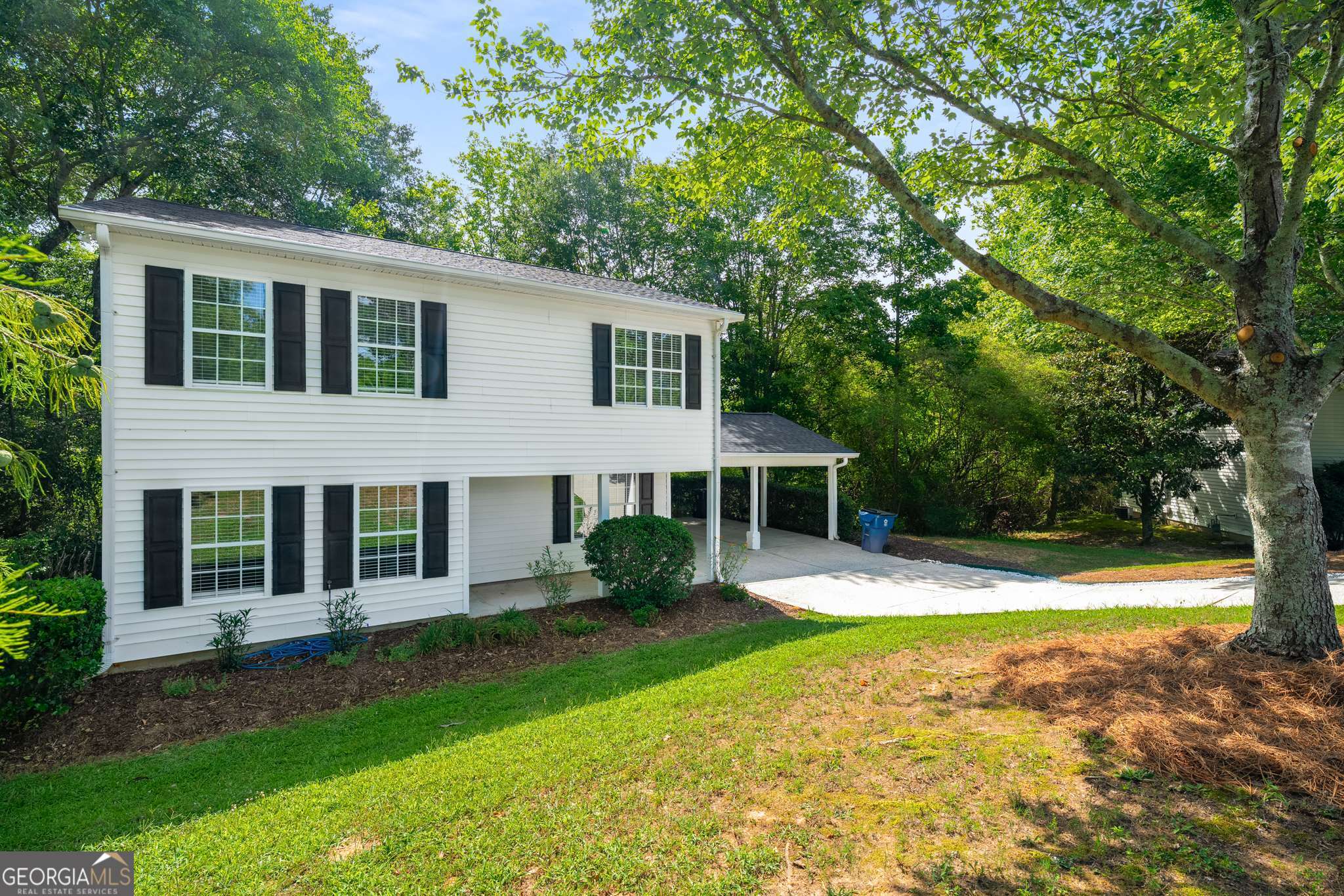 Welcome to 1550 Stelten Way - a beautifully updated 4-bedroom, 1.5-bathroom home offering 1,716 square feet of stylish and functional living space. Nestled on a quiet street just one mile from vibrant Downtown Alpharetta, this home perfectly blends modern convenience with timeless comfort. Step inside to discover a bright, open-concept layout featuring fresh interior paint, rich hardwood floors, and designer lighting throughout. The inviting kitchen is a showstopper with white shaker cabinets, quartz countertops, brand new stainless steel appliances, a subway tile backsplash, and a breakfast bar island perfect for casual dining or entertaining. Relax in the spacious living and dining area, then retreat to the cozy bedrooms for restful nights. The full bath boasts a custom tile shower/tub combo and sleek black fixtures. A dedicated laundry room with built-in storage adds everyday convenience, and all major systems have been updated for peace of mind. Enjoy community features at the nearby Wills Park, or have your pick of fare in downtown Alpharetta.Located in the sought-after Milton High School district, this home also provides quick access to Avalon and GA-400.