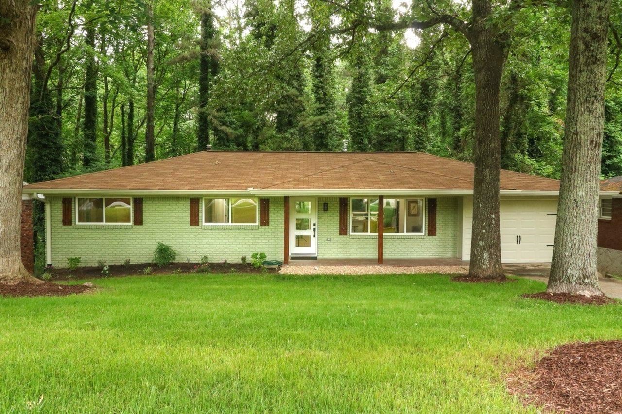 Yes, she is just as beautiful on the inside as she is on the outside. You must see this 4-sided Brick Ranch home in the desirable East Point community of Pomona Park. This 3-bedroom 2 bath has been fully renovated with NEW HVAC, Electric, Plumbing, Roof, Windows, Doors. The kitchen is full of natural light and is darned with beautiful white shaker cabinets, quartz countertops, brand-new stainless-steel appliances, and a spacious island with additional seating perfect for any family and entertaining. The bathrooms have been redesigned with beautiful tile patterns and high-end finishes. The completely open floor plan is complimented by an outside deck that provides an ideal space for relaxing in the sun or outside dining. Close to downtown, Tyler Perry Studios and Marta. Hurry, schedule a showing before she is gone!