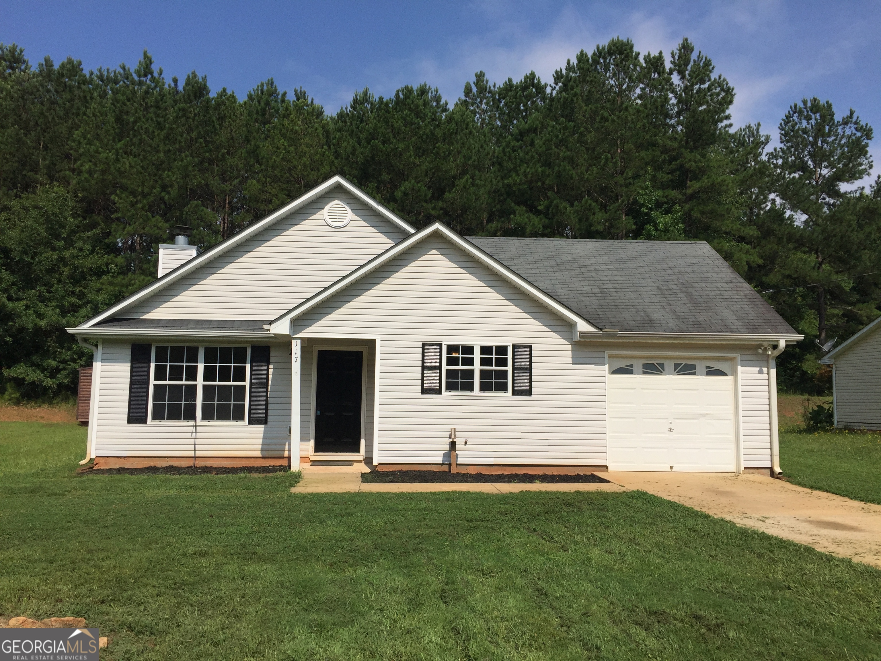 Total electric recently renovated 3 bedroom 2 bath ranch style home on level lot with 1 car garage attached and 2 storage sheds in backyard. Hardwood floors, carpet, and fireplace.