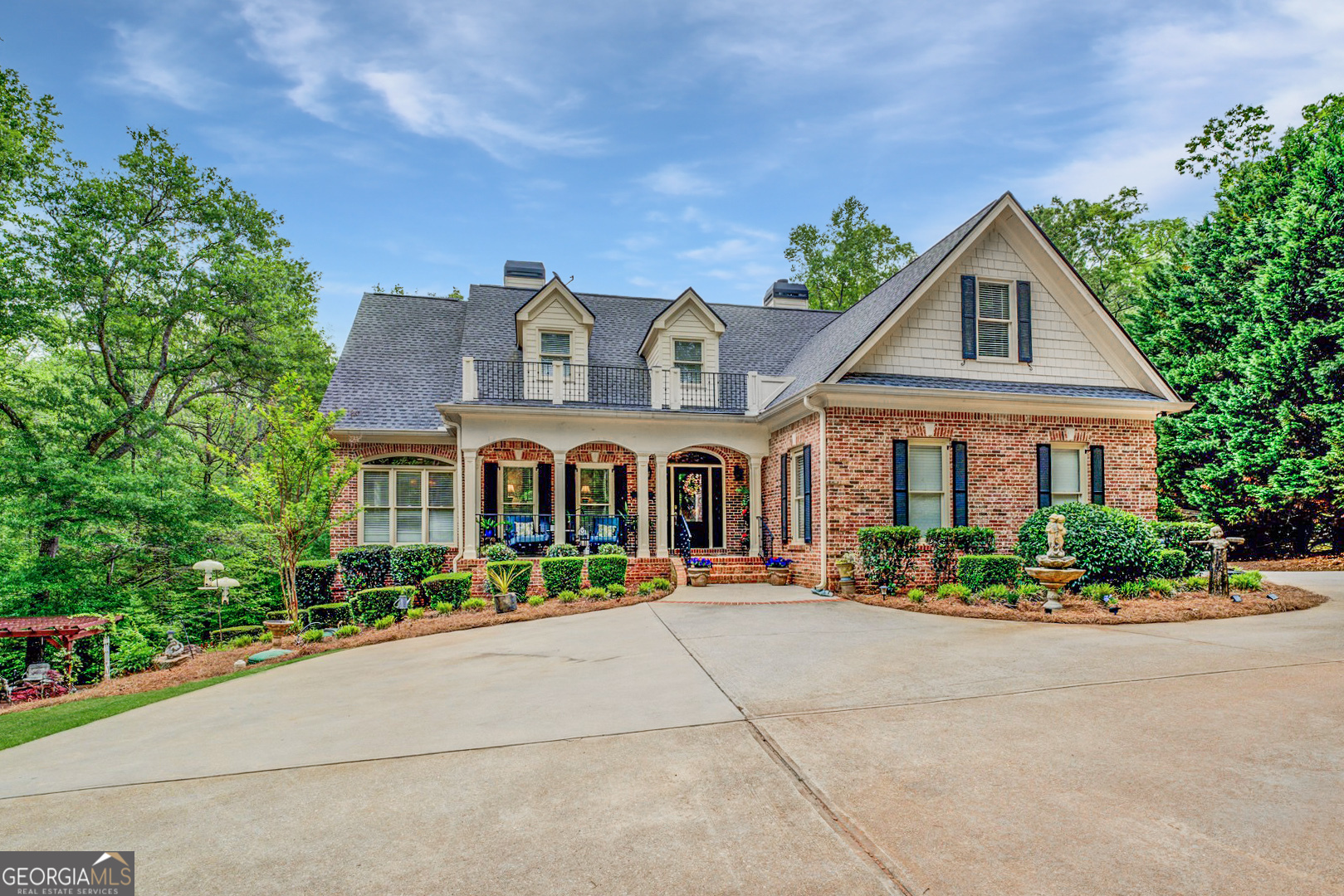 One of a kind, custom built retreat, located in a prestigious North Oxford, gated community, The Gated Estates of Weslyan. Nestled on 2 private acres, with in-ground pool, hot tub, outdoor kitchen, and in-law suite terrace level with full kitchen and laundry offers the perfect blend of elegance and comfort. This impeccably maintained 5 bedroom, 4.5 bath residence with additional bonus room and office, boasts high-end finishes, a thoughtful layout, and resort-style outdoor living, designed for both everyday living and grand entertaining. The main level features a luxurious primary suite complete with a private office or sitting room, gas log fireplace, his and hers walk-in closets, and spa-like en-suite bath with new quartz countertops and travertine tile flooring. The heart of the home includes a formal dining room with exquisite trim work, formal sitting area, an oversized laundry room, and a chef's kitchen with all new appliances, gas range, double ovens, warming drawer, new granite countertops, and walk in pantry. Upstairs, you'll find three additional bedrooms, two full baths, a versatile bonus room, and a convenient office nook-perfect for remote work or crafts. The fully finished basement expands your living space with a full second kitchen, full bath, laundry, bedroom, and expansive recreational area-ideal for guests, in-laws, or entertaining. Step outside to your personal paradise: an in-ground saltwater pool with water feature, hot tub, outdoor kitchen, screened-in porch, and a spacious deck, with new Trex decking, and second floor balcony, all overlooking the beautifully landscaped backyard. The garage is already wired for an electric vehicle, a full home generator was added in 2023, 5 year old roof, freshly painted- all the maintenance is done! The small, one street community of executive homes, is the tranquility you have been searching for. This is more than a home-it's a lifestyle. Additional features and upgrades are listed in documents. Don't miss your chance to own this one-of-a-kind retreat. Must have appointment.