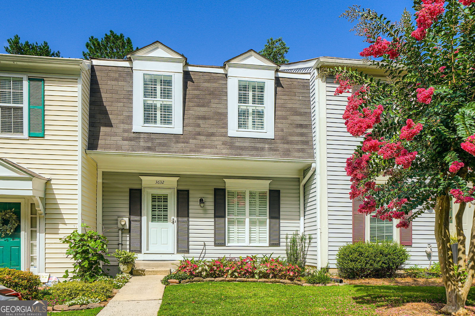 Stylish 2-Bed/2.5-Bath Townhome with Updated Kitchen in Peachtree Corners! Welcome to this beautifully updated 2-bedroom, 2-bathroom townhome located in the highly desirable Peachtree Corners, GA. Situated in a quiet, well-maintained community with low HOA fees, this home offers comfort, style, and convenience. The Forum & Town Center are just a short distance and have plenty of shopping and dining options including Trader Joe's! Step into the open-concept main level featuring a spacious living and dining area that flows seamlessly into a fully updated kitchen. Modern finishes and sleek cabinetry make this kitchen a standout-perfect for both everyday living and entertaining. Upstairs, you'll find two generously sized bedrooms, each with its own private en-suite bathroom, ideal for privacy and flexibility. The unfinished basement provides endless potential-great for storage, a home gym, or future expansion. Enjoy easy living in a community that takes care of lawn maintenance so you can focus on what matters most. Conveniently located near top-rated schools, shopping, dining, and parks, this townhome is a perfect fit for first-time buyers, investors, or anyone looking to enjoy the best of Peachtree Corners. Don't miss out-schedule your private tour today!