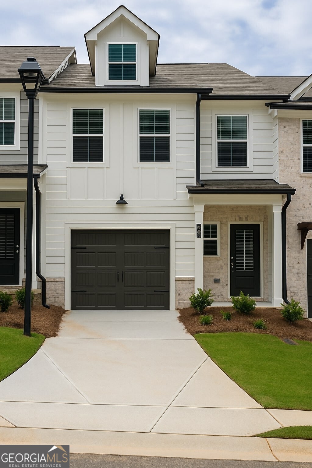 The Willow plan built by Create Homes. Quick Move-In! Enjoy the convenience of prime location close to shopping, dining, Hartsfield-Jackson International Airport, I-285, I-20, I-75 and the East-West Connector. Within walking distance to vibrant downtown Austell, this stunning new residence seamlessly blends contemporary style with functional living, creating a space that elevates your everyday. Enter into the open-concept main level which offers a modern kitchen featuring stylish counter tops, stainless steel appliances, a spacious island, and soft-close cabinets and drawers. This space seamlessly flows into the dining and living areas, making it ideal for both everyday living and entertaining. A private rear patio extends your living space, providing a great spot to unwind and enjoy the outdoors. Upstairs you'll find the primary suite offers a spacious retreat with a double vanity, a walk-in closet, and modern hardware and fixtures for a sleek, contemporary feel. The laundry room is conveniently located nearby, and two secondary bedrooms with a full bath completes this floor. Built by Create Homes, this energy-efficient town home features smart home technology and quality construction. Ask us about our up to $10,000 towards closing costs or options incentive*. Must use Seller's Preferred Lender with binding contract by 09/15/2025 and close by 10/15/2025.