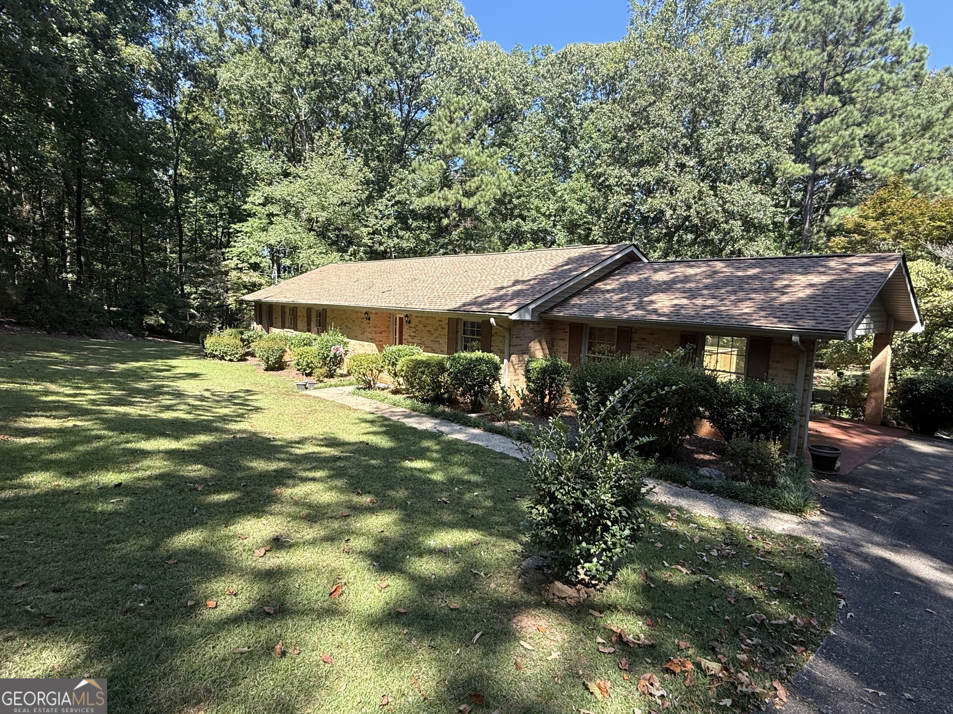 Beautiful brick home on an incredible lot. You can sit on your back deck and listen to the boats on west point lake.