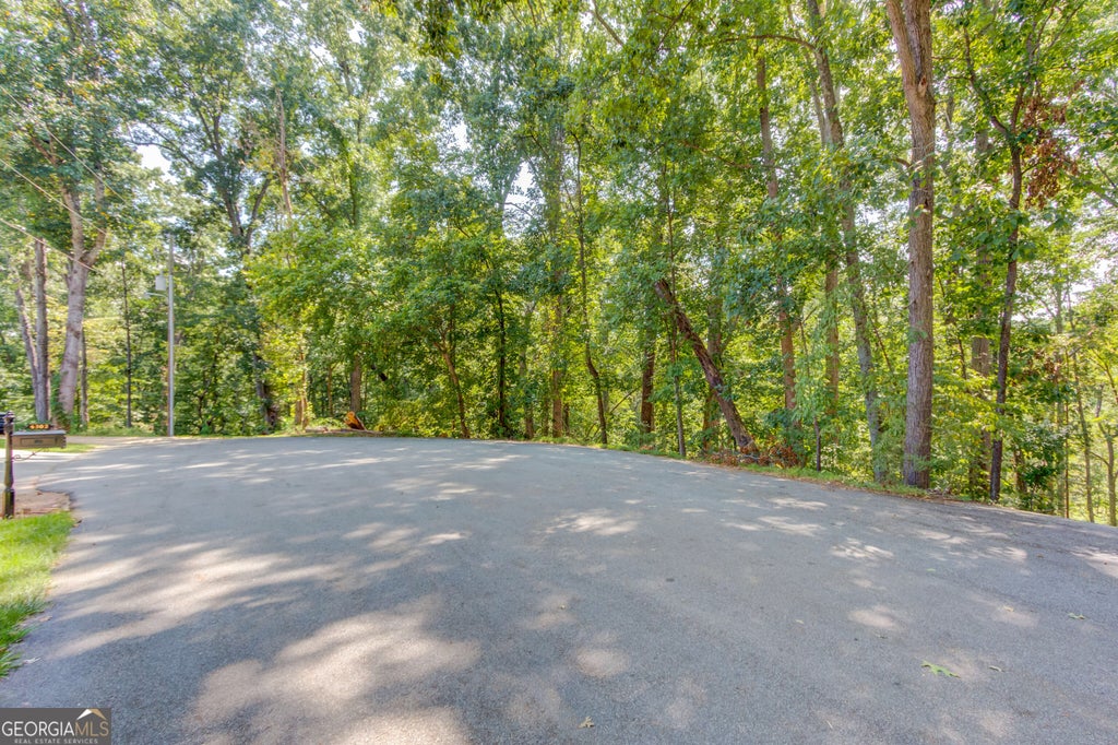 Photo of 4301 Holiday Heights Drive, Oakwood, GA 30566 (MLS # 10835370)