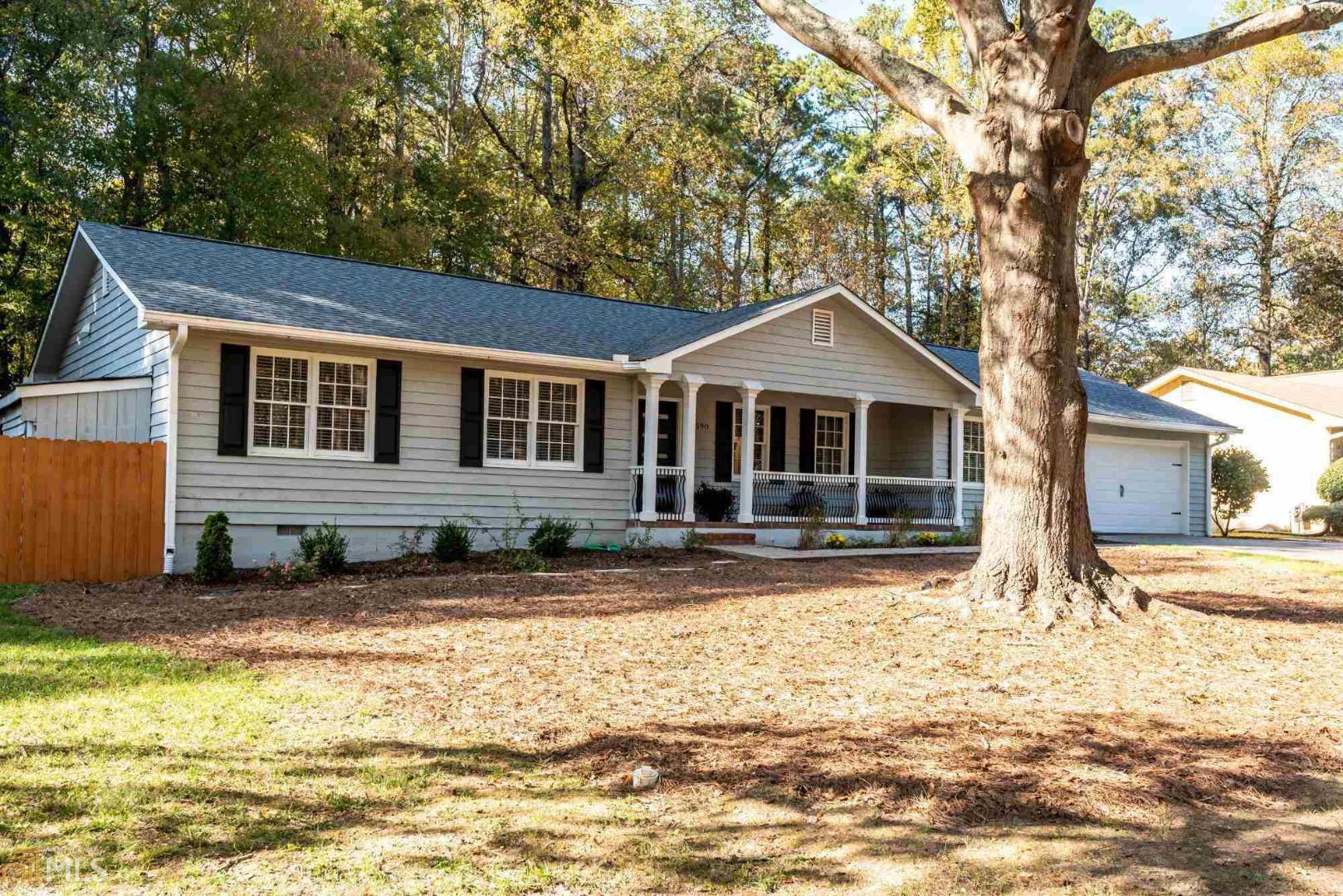 Motivated Seller!!! Bring All Offers!!! You will love this professionally redesigned custom 3-bedroom, 2-bathroom spacious ranch home in Marietta that has endless custom features. This entertainer's delight highlights an open concept floor plan with new hardwood floors throughout, a completely updated gourmet kitchen with Quartz countertops and brand new, high-end stainless steel appliances. The expansive sunroom overlooks a beautifully landscaped fenced backyard which spotlights a workshop with its own garage door. All of this situated in a convenient, friendly neighborhood is only minutes from downtown Atlanta, downtown Marietta, downtown Smyrna, Atlanta Hartsfield Airport and The Battery.