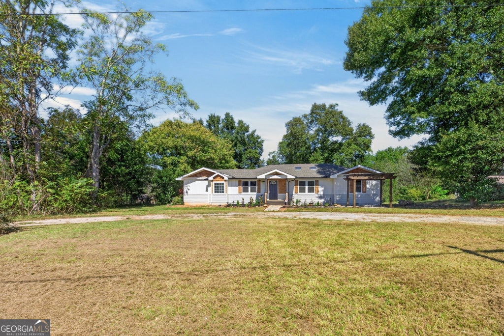 Photo of 813 Tyus Road, Bowdon, GA 30108 (MLS # 10870897)