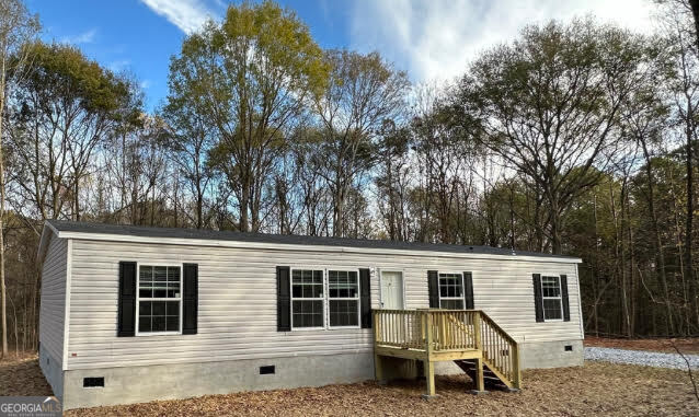 Price reduction & seller has agreed to contribute to closing cost!! Like-New 2023 Fleetwood Mobile Home on 1.25 Acres - Move-In Ready! Discover comfortable country living in this beautifully maintained 2023 Fleetwood mobile home, set on a spacious 1.25-acre lot in Canon, GA (Hart County). This home features 4 bedrooms, 2 full bathrooms, and a bright, open floor plan designed for modern living. Enjoy the outdoors from your 6x6 front deck or relax and entertain on the larger 8x10 back deck. Inside, the home offers a spacious kitchen equipped with stainless steel appliances-including a refrigerator-and a convenient mud/laundry room located just off the back entrance. The expansive backyard provides plenty of space for future additions like an outbuilding, garden, or play area. The home is set on a block foundation with a stucco finish and is built to FHA standards-making it eligible for FHA, Conventional, and possibly USDA or VA financing. Don't miss this move-in ready gem in a peaceful, rural setting-schedule your showing today!Floor plan pictured is of the model that was purchased. Listing photos are of home when it was new. Home is in similair condidtion and well maintained.Please see private remarks or call listing agent for more details.