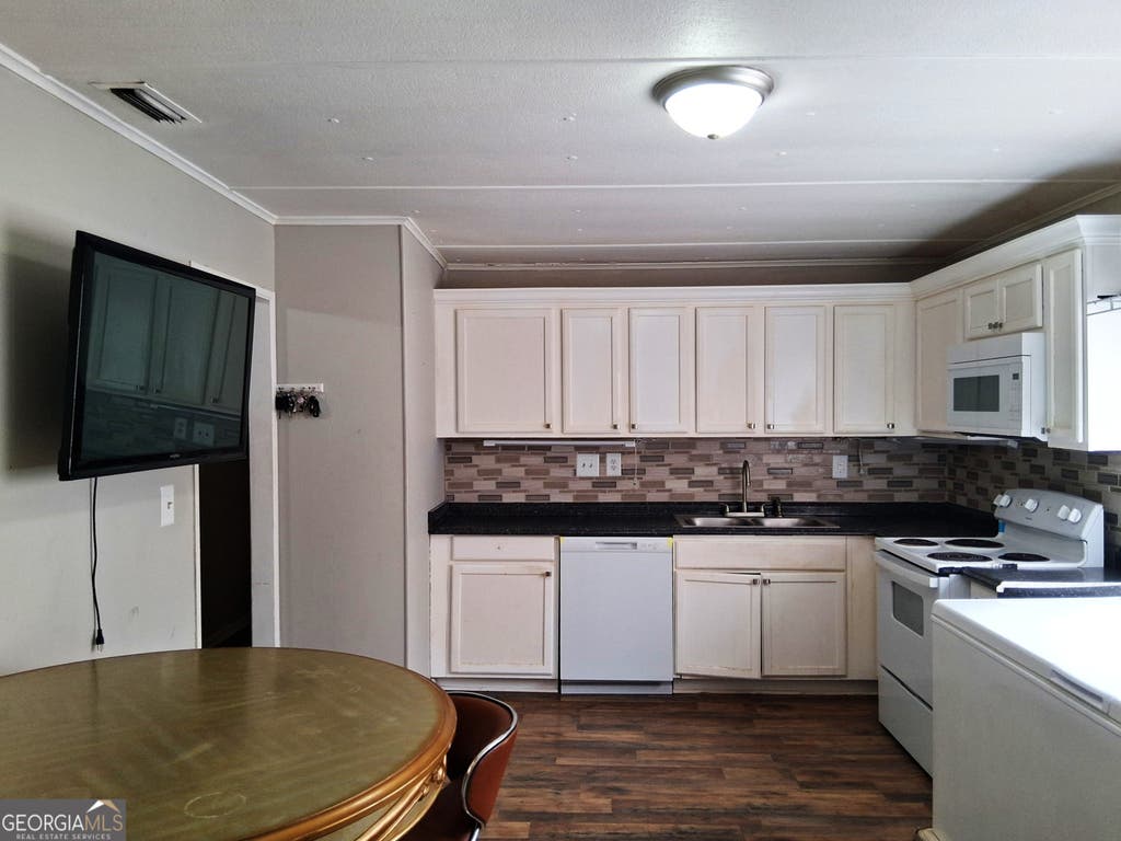 Photo of 2732 Village Green Lane, Macon, GA 31206 (MLS # 10826963)