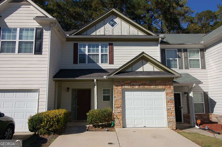 Freshly painted townhome, ready for move-in!  The main level has an open floorplan with laundry.  Garage parking, privacy fenced back yard with trees beyond for added privacy.  Convenient location with access to MARTA.  Property is also available for rent.