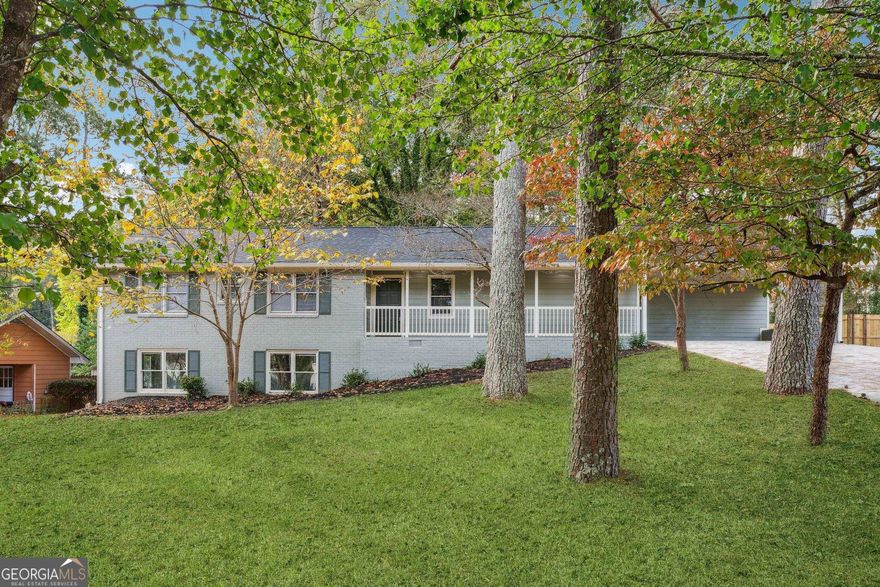 Absolutely gorgeous and UPDATED inside and out! You must view this home to appreciate the beauty. You'll find three bedrooms and two and a half baths on the main level of this ranch home, and a large bonus room in the basement (plus an unfinished room for storage). Sitting on one half acre, you have an almost level fenced in backyard with a new wooden deck ready for cool weather. An eat-in kitchen with bar seating opens into a long living room with a brick fireplace. Parking includes a two car brick carport attached to the home.  The list of contractor updates include: -Fully updated Rehab -new HVAC system -all new plumbing lines inside home -new roof -Large finished room in basement with windows & exterior door.  -Updated Kitchen - Quartz Countertops and all new Cabinets -new appliances stainless steel -all new flooring throughout -new Interior paint -all new exterior siding  -new Deck in backyard -new exterior paint -all new plumbing fixtures -all new Sinks in Kitchen & Bathrooms -new quartz countertops in bathrooms  - new tile showers -all new lights fixtures inside & outside home -all new outlets & switches throughout home -new mini blinds -Large unfinished storage room in basement Make an appointment today and let's put your LAST name on this FRONT door!