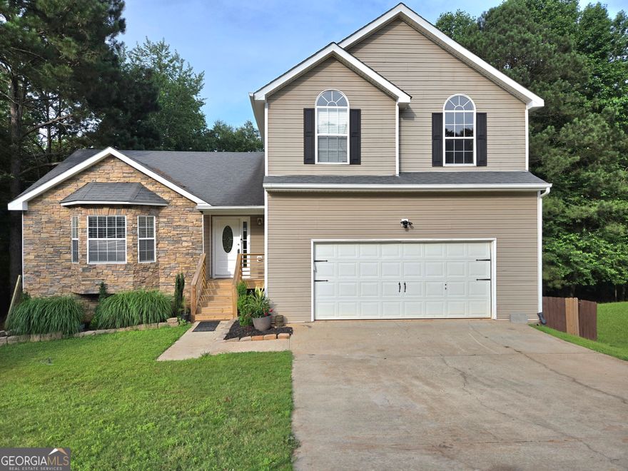 Welcome to this beautifully updated three-bedroom, two-and-a-half-bath home nestled in a quiet, established neighborhood. Featuring an unfinished basement with rough-ins for a future bathroom and walk-out access to the pool, this home offers both style and future potential.    Enjoy summer in the fully serviced pool, surrounded by a spacious, private backyard and an oversized deck-perfect for entertaining or relaxing.    Inside, the home boasts fresh paint, new hardwood floors, and designer lighting throughout. The open-concept kitchen flows seamlessly into the main living spaces, creating a warm and inviting atmosphere.    Retreat to the primary suite with custom closets, while secondary bedrooms feature their own custom storage solutions. The garage includes additional custom shelving for optimal organization.    With new landscaping, updated shrubs, and a move-in-ready condition, this home is the complete package. The seller is motivated-come see the potential for yourself!