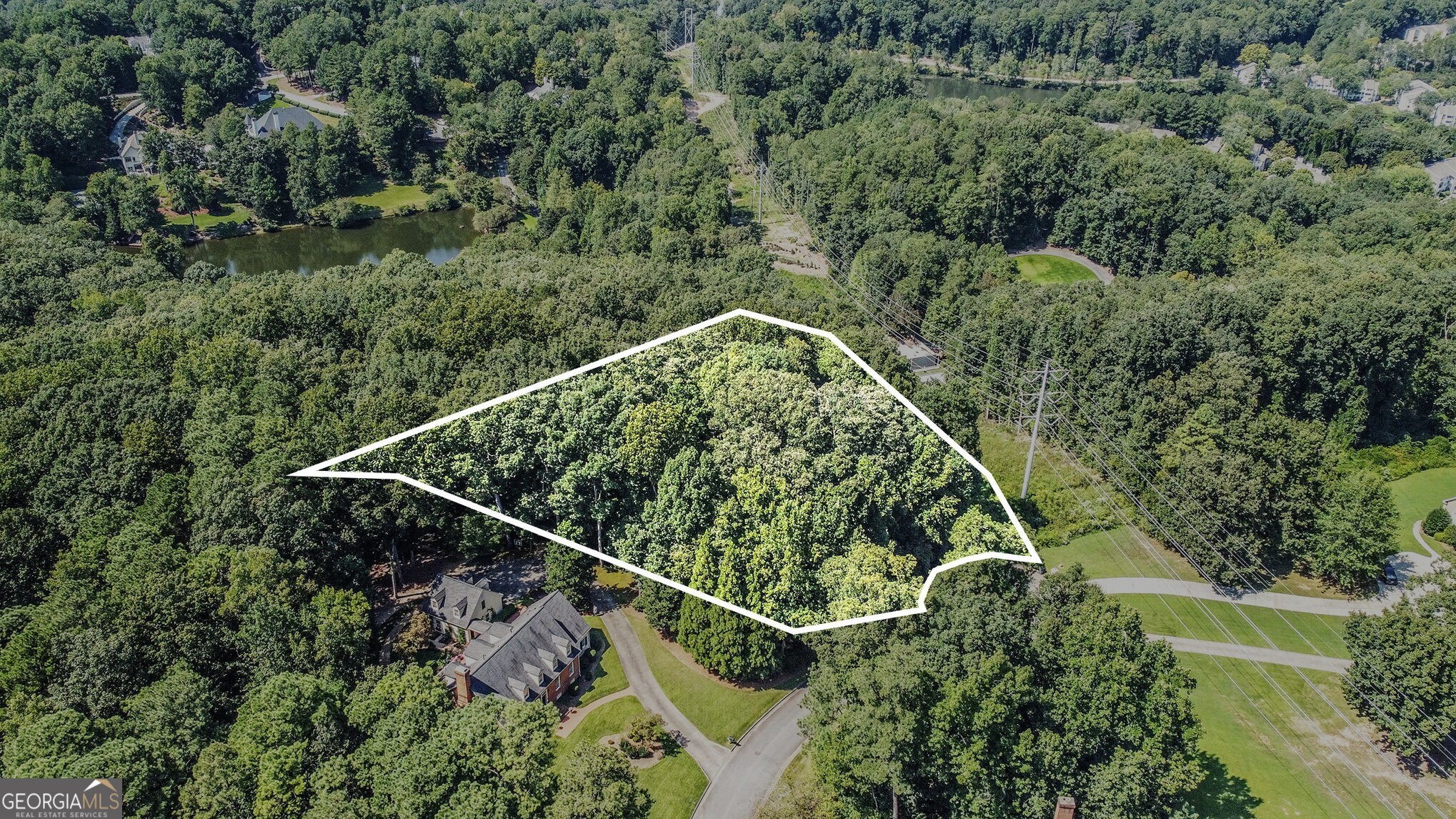 Exceptional Opportunity in Sandy Springs! Build your Dream Home on over 2 Acres in the highly sought-after Dunraven Place subdivision. Perfectly situated at the end of a Quiet Cul-de-Sac and surrounded by Beautiful, Well-Maintained Homes, this lot offers the ideal combination of Privacy and Community within a Developed Neighborhood. Zoned for Top-Rated Spalding Drive Elementary School and just minutes from the Chattahoochee River and Orkin Lake, this property sits in the heart of the Sandy Springs Park District. Enjoy endless outdoor activities with nearby Lost Corner Nature Preserve, Steel Canyon Golf Club, Abernathy Greenway, and Morgan Falls River Dog Park. This location is also ideally situated just minutes from I-285, Luxury Shopping at Perimeter Mall, the Sandy Springs Farmers Market, and all the fun at City Springs Center featuring Interactive Fountains for kids, Delicious Dining Options, and the Performing Arts Center. Offering Unmatched Convenience, this is truly a Rare Find an expansive lot in a prime location with endless potential. Don't miss your chance to own in the Vibrant Heart of Sandy Springs and create something extraordinary!