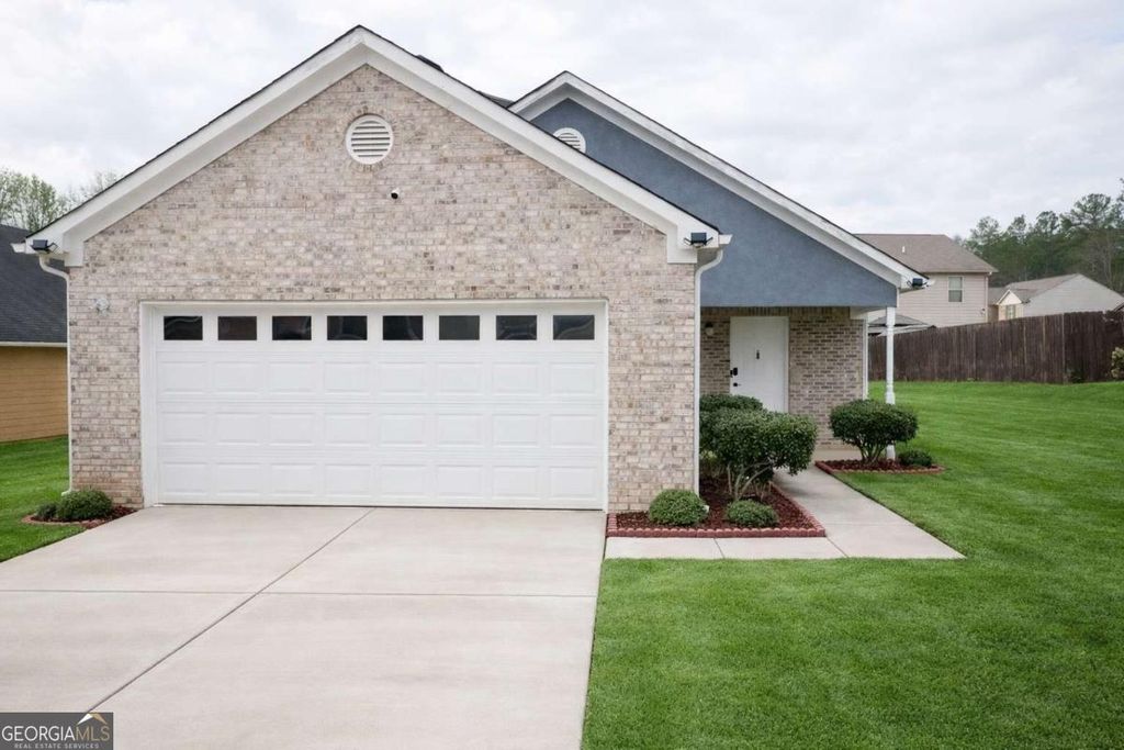 Photo of 10941 Station Drive, Hampton, GA 30228 (MLS # 10682615)