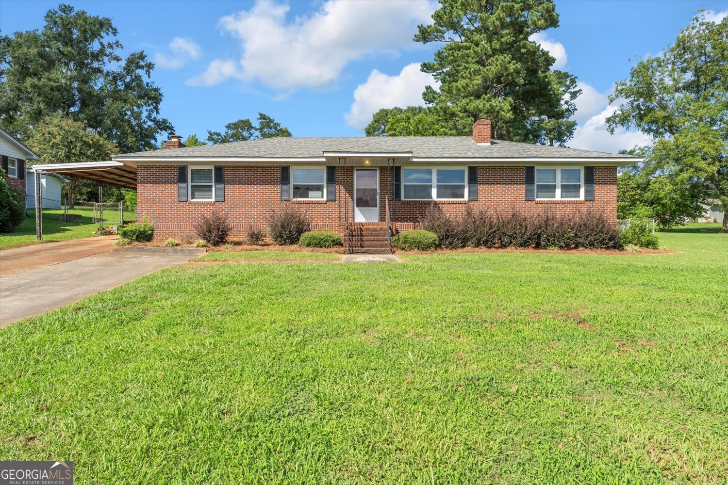 New to the Market! Welcome to this beautifully updated 3-bedroom, 2-bath all-brick ranch in Washington, GA. Step inside to find fresh paint throughout most of the home, a brand-new front door, and gleaming hardwood floors that flow across spacious living areas. The updated roof and HVAC provide peace of mind, while the kitchen is perfectly suited for everyday living. Enjoy the convenience of an attached covered carport and the privacy of a fenced backyard - ideal for entertaining or relaxing outdoors. Perfectly positioned just 45 minutes from Augusta and Athens, this home combines comfort, charm, and location in one exceptional package. Don't miss your chance to make it yours!