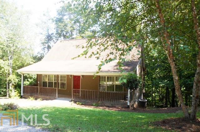 MOVE IN READY CAPE COD HOME WITH LOFTY OPEN CONCEPT DESIGN. Quiet single lane community creates a neighborhood with very little traffic. This particular home is bound by the Henderson Falls Community Park to protect your investment, not to mention the densely wooded backdrop, where the full length covered back deck creates a tree house affect. Ah, peace, quiet & privacy as you relax at the end of the day. Spacious living room, dining room and kitchen areas are where memories will be made. Main floor hosts 2 guest suites, full bath & laundry. The owner's suite is privately located on the upper level with an unexpected large bath w/whirlpool tub & separate shower. Walk-in closet is another added feature. More? Sure, full unfinished basement, for storage.