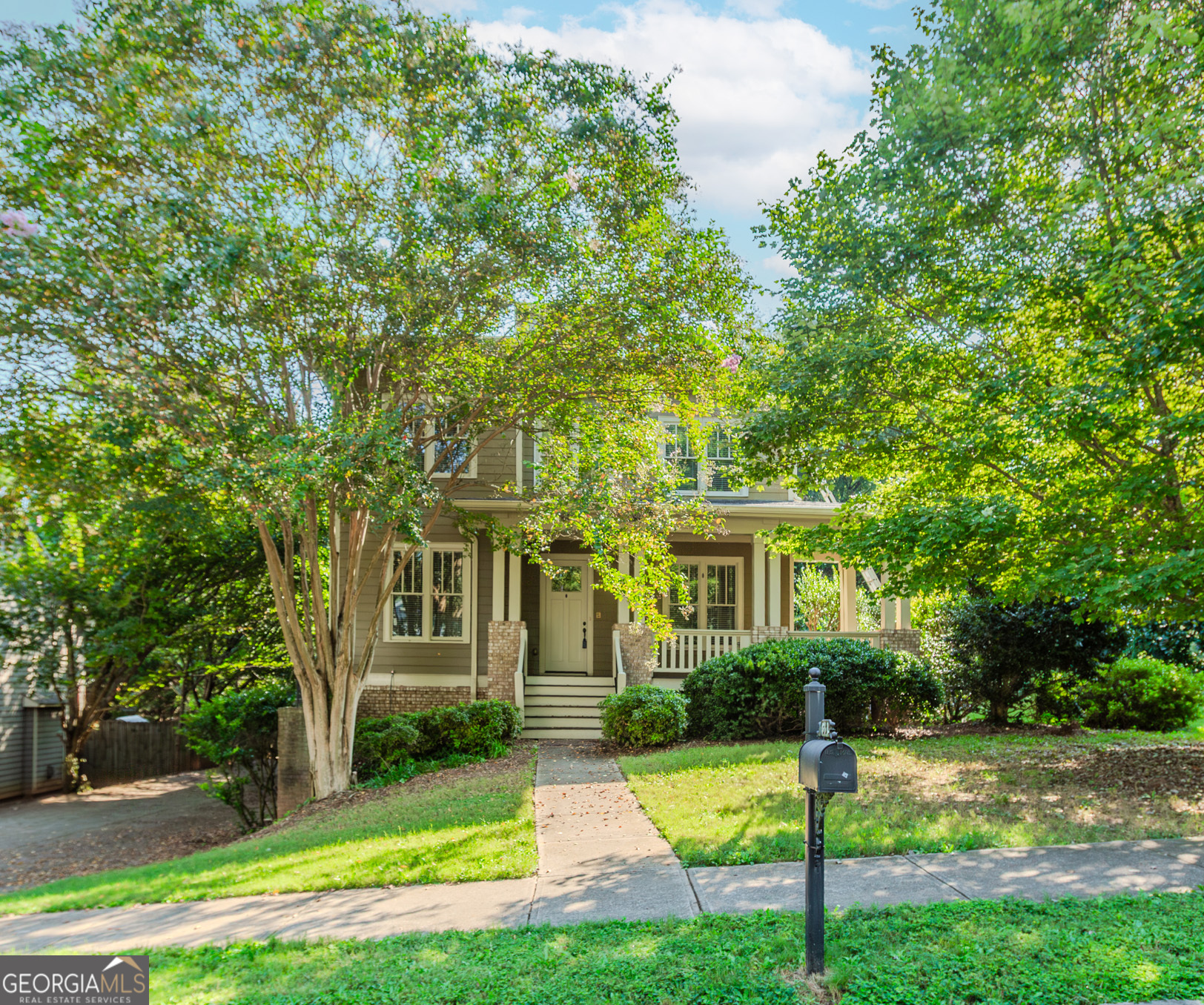 MINUTES TO EMORY UNIVERSITY, 15 MINUTES TO DOWNTOWN ATLANTA AND 25 MINUTES TO HARTSFIELD-JACKSON INTERNATIONAL AIRPORT *CHARMING WRAP-AROUND FRONT PORCH *HARDWOOD FLOORS THROUGHOUT MAIN *LARGE FAMILY ROOM WITH COFFERED CEILING, TWO BUILT-IN BOOKCASES, GAS LOG FIREPLACE AND OPEN VIEW TO THE KITCHEN *GOURMET KITCHEN WITH BREAKFAST BAR ISLAND, GRANITE COUNTERS, TILED BACKSPLASH, STAINLESS STEEL APPLIANCES AND BREAKFAST ROOM *FORMAL DINING ROOM WITH BUTLER'S PANTRY *MAIN LEVEL GUEST BEDROOM WITH ENSUITE *UPPER LEVEL PRIMARY SUITE WITH DOUBLE TRAY CEILING *PRIMARY ENSUITE WITH DUAL VANITIES, JETTED TUB, OVERSIZED WALK-IN SHOWER AND WALK-IN CLOSET *2 GENEROUSLY SIZED SECONDARY BEDROOMS JOINED BY A FULL BATHROOM *UNFINISHED, DAYLIGHT BASEMENT WITH PRIVATE ENTRANCE, STUBBED FOR BATHROOM OFFERS TONS OF STORAGE SPACE AND ROOM FOR EXPANSION *COVERED BACK DECK *2 CAR GARAGE WITH AMPLE DRIVEWAY PARKING *NO HOA