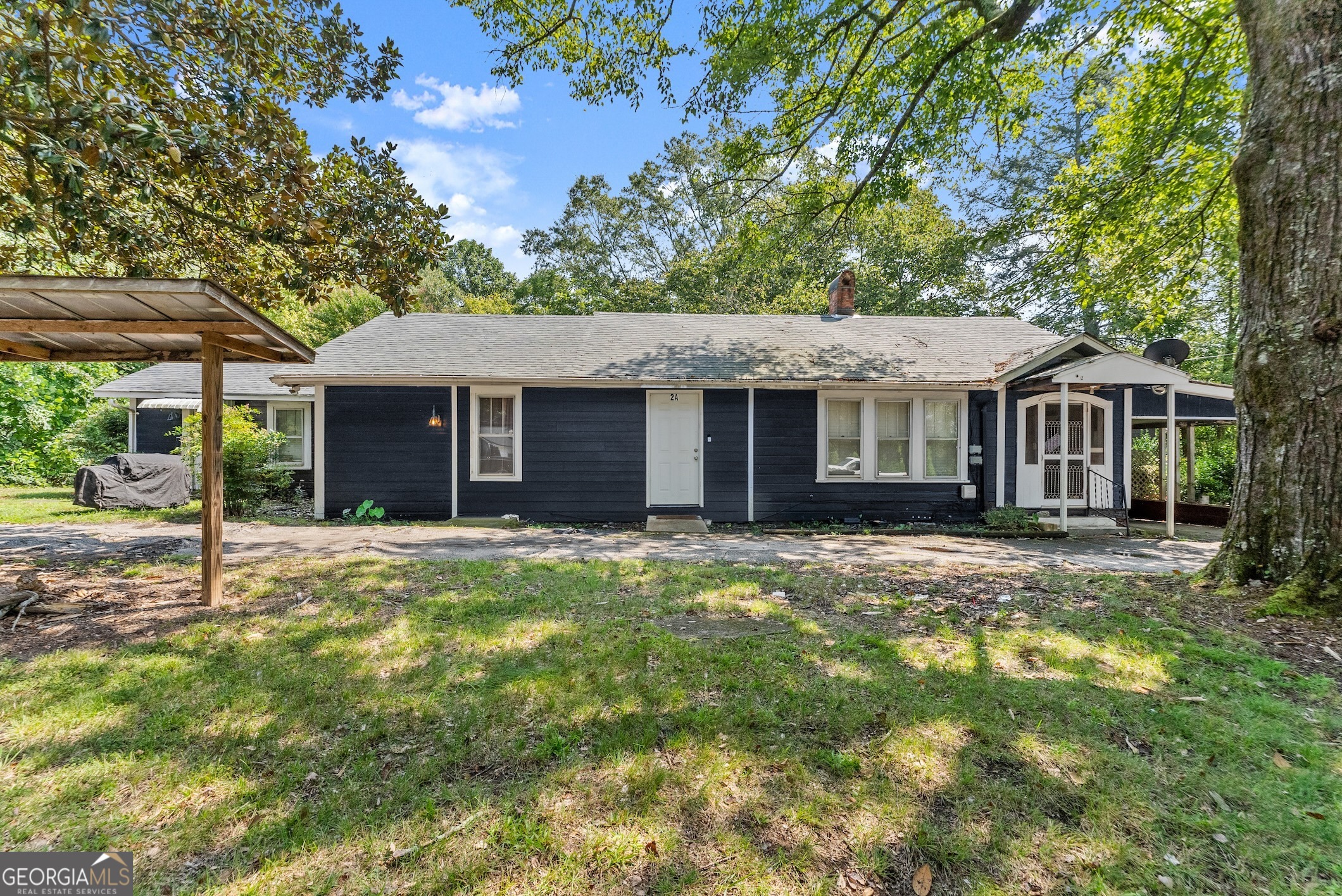 Deals like this don't come around often. This 5-unit property sits on a spacious 2.4-acre lot with updates throughout. The detached unit in the back was fully renovated in 2023, featuring a new roof, windows, drywall, flooring, appliances, and its own mini-split A/C. Inside the main building, Units 2A and 2B were reconfigured and renovated with new kitchens, baths, flooring, appliances, paint, and mini-split systems. Additional improvements include updated electrical work, a new panel box in Unit 4, and several new appliances across multiple units. Shared coined operated laundry provides extra income, and tenants can enjoy Hazel Creek right in their backyard. Located between Piedmont University and Northeast Georgia Medical Center, this property offers strong potential for both long-term and mid-term rental strategies.
