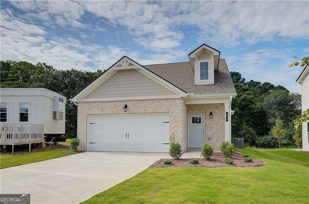 Photo of 265 Abbotts Crossing Circle, Conyers, GA 30094 (MLS # 10718645)