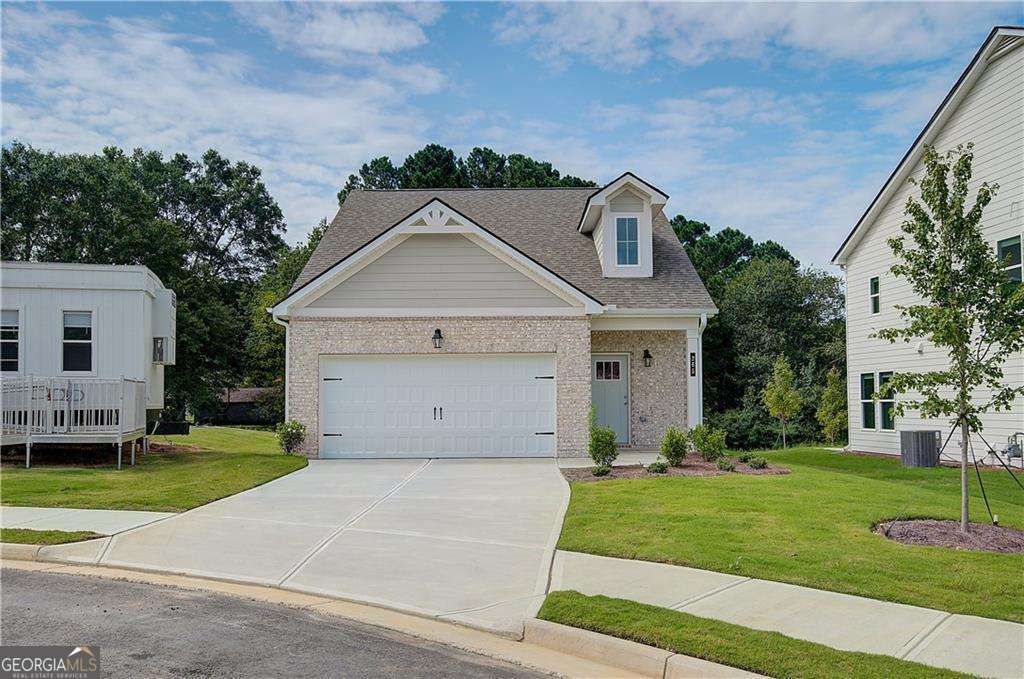Photo of 265 Abbotts Crossing Circle, Conyers, GA 30094 (MLS # 10718645)