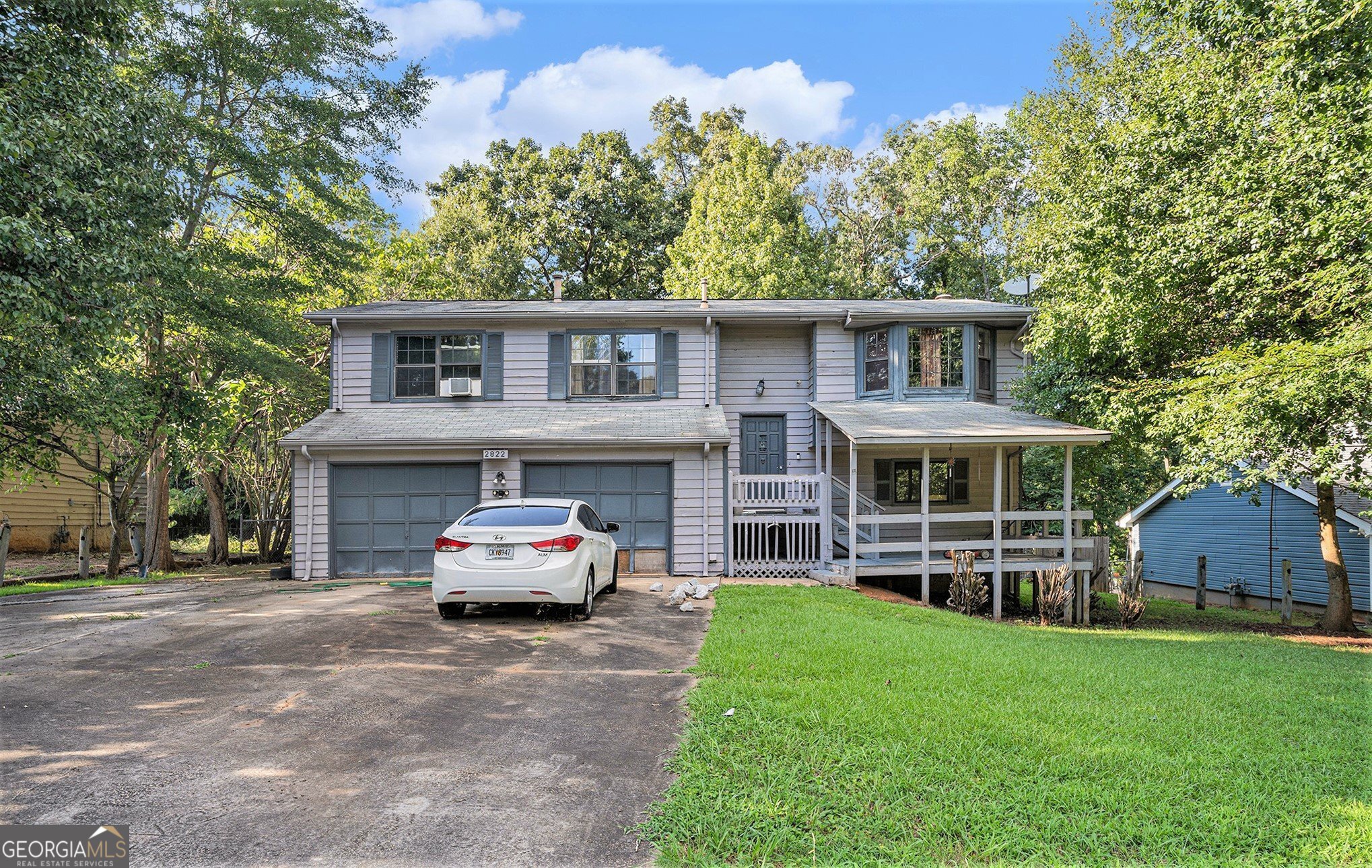 Spacious Split-Level Living in Old South Subdivision - Jonesboro, GA! ?? Welcome to this versatile 4-bedroom, 3-bath split-level home located in the well-established Old South Subdivision-where charm meets opportunity and freedom! With NO HOA and zero rental restrictions, this property is perfect for homeowners, investors, or multigenerational living. Step inside and enjoy a functional layout with plenty of space for everyone, including a bonus room perfect for a home office, playroom, or media space. Relax on the cozy front porch or entertain out back on the deck (seller is open to giving credit for needed TLC). The oversized backyard is a true highlight-featuring an RV shed and two detached buildings ready to be transformed into your dream workshop, guest house, rental unit, man cave, or she shed. Whether you're looking to expand, create, or generate additional income, the possibilities here are endless. Don't miss your chance to own this unique and flexible property with room to grow, play, and profit-all with no community restrictions! Schedule your tour today and unlock the full potential of this Jonesboro gem!