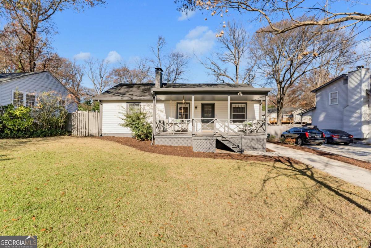 Renovated home near new Beltline in the sought-after neighborhood of Berkeley Park! This beautifully updated home offers 3 spacious bedrooms and 2 bathrooms. Stunning hardwood floors throughout, creating a warm and inviting atmosphere. Chef's kitchen, featuring elegant quartz countertops and updated appliances. The primary suite offers a tall vaulted ceiling, walk-in closet and luxurious bathroom. The private backyard is a true oasis, including a large back-deck & firepit-patio area, and is fully fenced for your peace and privacy. Enjoy outdoor gatherings or simply relax in your serene retreat. Located near the Beltline, The Grove, The Interlock & The Works (all within a mile) - you'll have easy access to the area's best dining, shopping, and recreational opportunities. Don't miss the chance to make this stunning property your new home.