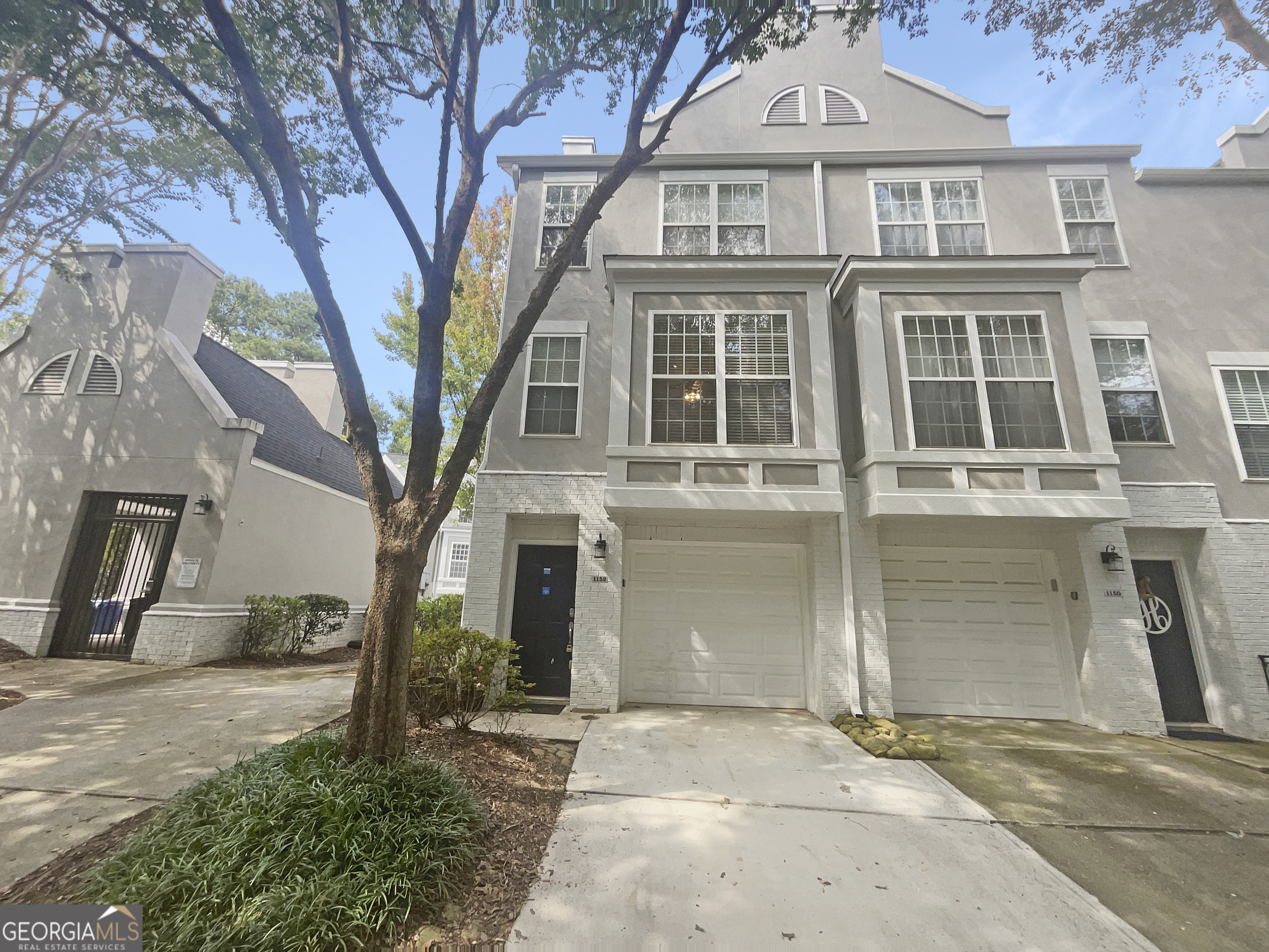 Welcome Home! This end unit townhouse is located in a small gated community that's walking distance to the Beltline. The kitchen has stained cabinets, SS appliances, a breakfast bar and is open to the eat-in dining area and family room with built-ins. Upstairs you will find the bedroom with vaulted ceilings, walk-in closet and bath. The Laundry is conveniently located upstairs and washer/dryer are included. Step out to the deck perfect for entertaining family and friends. Situated just steps away to the community pool and gas grill. Amazing location, near East Atlanta Village, Glenwood Park, North Ormewood, Grant Park, Ponce City Market, Madison Yards, Little Five Points, restaurants and shopping. Easy access to Hartsfield-Jackson International Airport, I-20, I-75 and I-85.