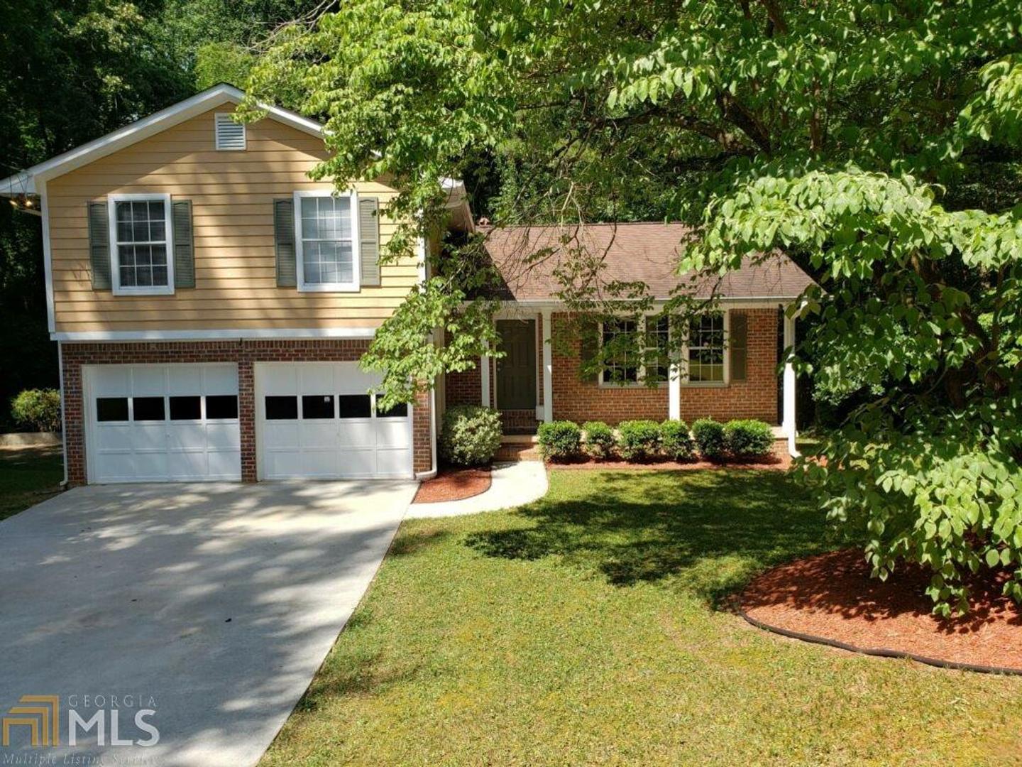 Move in Ready in Lithonia! This very well kept home is ready for a new family to enjoy! It features marble counters in the kitchen and bath, stainless steel appliances, kitchen tile backsplash, water filter, super nice garden tub in the master with a skylight, wood flooring and space to spread out. There is new paint and carpet and beautiful wood blinds that let in the perfect amount of sunlight. This home is in a cul-de-sac with a manicured yard AND a sitting porch and sun deck for the perfect bbq! Come take a look and make an offer...you will not be disappointed!