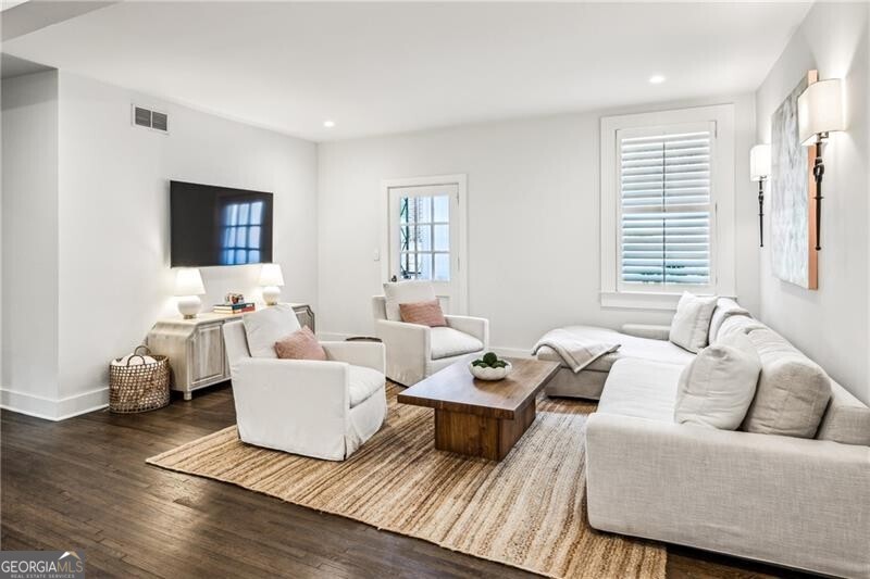 Welcome to this beautifully renovated 2-bedroom, 2-bathroom home in the heart of South Buckhead! Located just a short walk from the BeltLine and Bobby Jones Golf Course, this charming residence offers the perfect mix of comfort, style, and convenience. Inside, you'll find a bright and open layout with modern finishes, in-unit laundry, and stainless steel appliances. Both bedrooms are generously sized, and the updated bathrooms add a sleek, contemporary feel. Step outside to your covered and screened-in porch-ideal for relaxing and enjoying the peace and quiet of this lush and charming community surrounded by trees and nature. The unit also includes carport parking, with additional street parking available. Tucked away in a historic building surrounded on a quiet street, yet just minutes from shopping, dining, and recreation, this location truly can't be beat. Ready for immediate move-in - schedule your tour today!