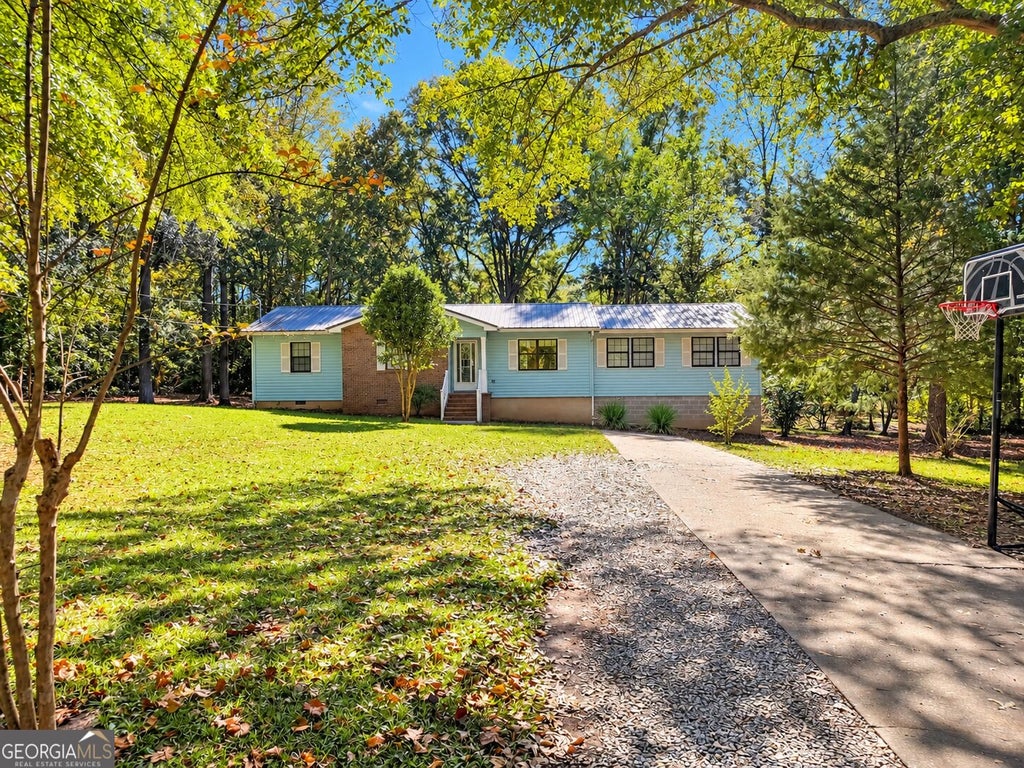 Photo of 137 Woodland Acres, Eatonton, GA 31024 (MLS # 10878741)