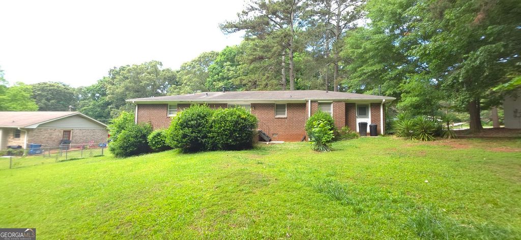 Photo of 1382 Mary Dale Drive SW, Lilburn, GA 30047 (MLS # 10762277)