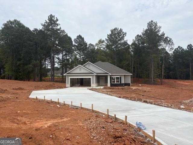 AMAZING NEW RANCH ON 1 ACRE WITH BRICK WATER TABLE. Awesome Top Selling 3BR/2BA Ranch Home on a Beautiful Wooded Homesite. Home Features Spacious kitchen with gorgeous quartz island, upgraded painted cabinets, farmhouse sink, upgraded tile backsplash & stainless steel appliances. Expansive family room with a cozy, relaxing fireplace. Large Master Suite with walk-in closet, dual quartz vanity and 5' shower. Two more sizable secondary bedrooms. LVP THROUGHOUT WHOLE HOUSE! Includes 4 zone irrigation system. ** Only $1,000 Earnest Money** Located in highly sought after, beautiful Jackson County, GA and convenient to the Pendergrass/Jefferson Exit or Maysville/Commerce Exit on I-85 for quick travel to Atlanta, GA, Lake Hartwell & Greenville, SC, as well as Hwy 129 for easy access to Athens, GA!!! Multi-Award Winning, Family Owned Builder. 1 Yr Builder's Warranty, 2 Yr Systems Warranty, 10 Yr Structural Warranty, 2 Pre-Closing Walk Throughs & a Smart Home Package. Call for builder incentives. Contingency acceptable if other property is listed or under contract. "Don't miss your chance on a beautiful new home in Eagle Heights with a budget Friendly HOA. Eagle Heights is convenient to dining, shopping and easy access to Greenville, SC, Atlanta, Ga, and I-85.`` Check out our beautiful, decorated model home in Eagle Heights for current design trends. Model Home Sun and Mon 1 pm-6 pm, Tue-Sat 11 am-6 pm. "Renderings and plans are for illustration purposes only and may include additions, options or modifications not part of the standard offering, and are subject to change without notice or obligation".