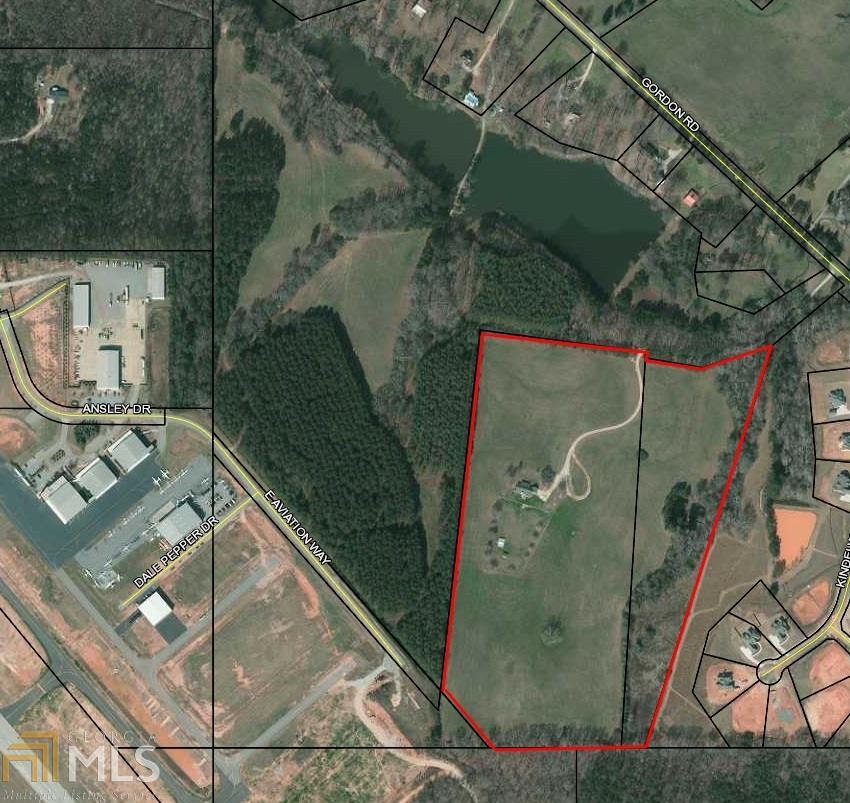 Excellent opportunity in prime location.  39.80 +/- acres with an additional 79 +/- acres available with access to E Aviation Way at the growing Newnan-Coweta Airport.  Close proximity to Bridgeport and Orchard Hills industrial developments an I85 Exit 41.  Topography of property is ideal for development with nearly the entire property usable acreage.  Price is based on the future value of the property as it is currently zoned.  Any offer contingent upon rezoning would need to be at a prevailing market value of similarly zoned properties.