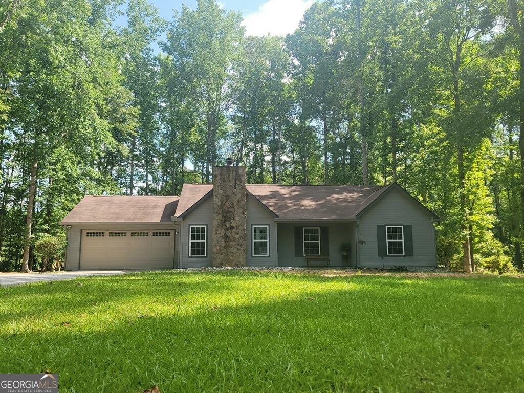 Completely renovated immaculate ranch features 3 bedroom 2 baths granite counter tops all new appliance, all new cabinets, breakfast bar, deck off master, walk in closet covered porch, vaulted family room with fireplace, 2 car spacious auto-garage, 1 plus acre, 12 x 25 deck. Great Fayette County Schools.
