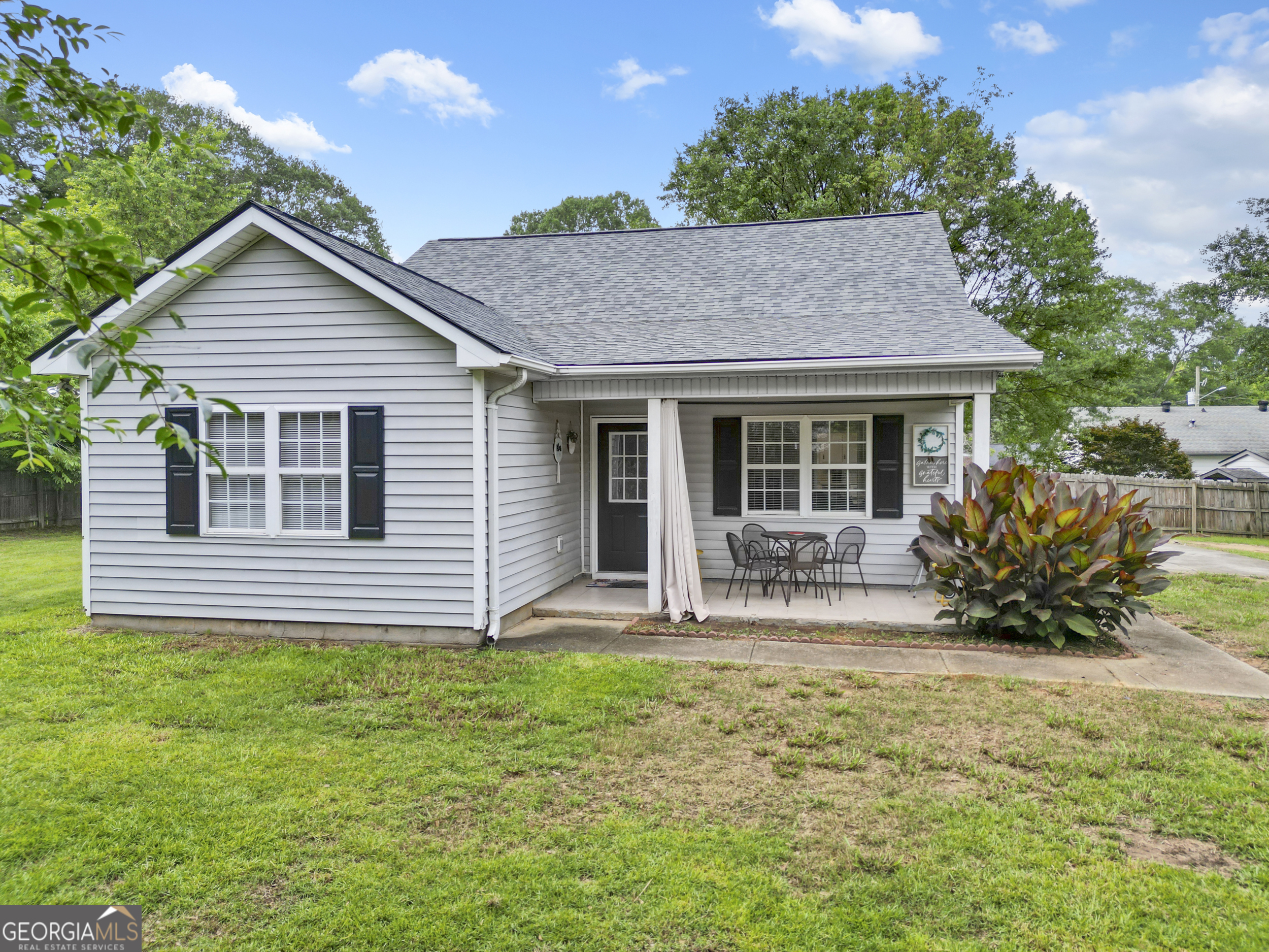 Welcome to this charming ranch-style home in Winder, Georgia! This spacious property features 3 bedrooms, 2 full bathrooms, a full kitchen, and an open-concept living and dining area-perfect for relaxing or entertaining. The layout offers flexibility and tons of potential to bring your vision to life. Enjoy mornings or evenings on the inviting front porch, soaking in the peaceful surroundings of your private, fenced-in yard. The property sits on a gated lot with its own driveway and includes storage sheds for added convenience. With no HOA restrictions, this home offers freedom and flexibility, whether you're looking for a personal residence or an investment property. Previously used as a successful Airbnb and long-term rental, all furniture available for purchase separately-making this a turnkey opportunity for investors or buyers seeking a ready-to-move-in home.