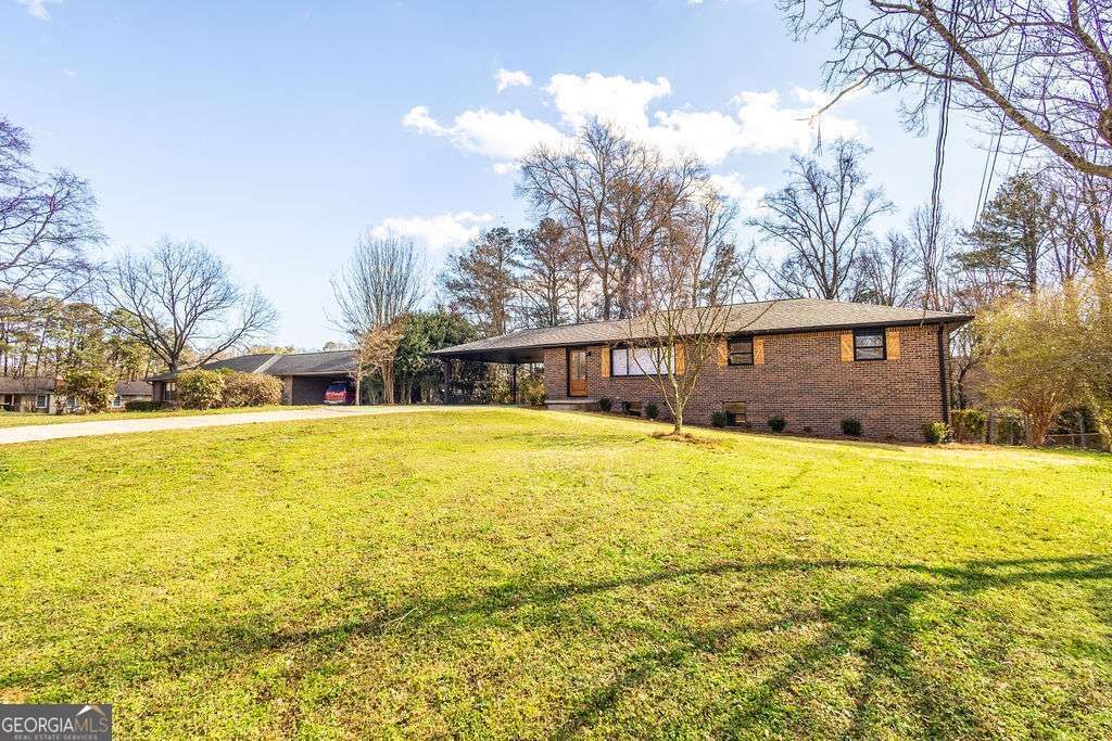 Photo of 3253 Shadowridge Drive SW, Marietta, GA 30008 (MLS # 10697282)