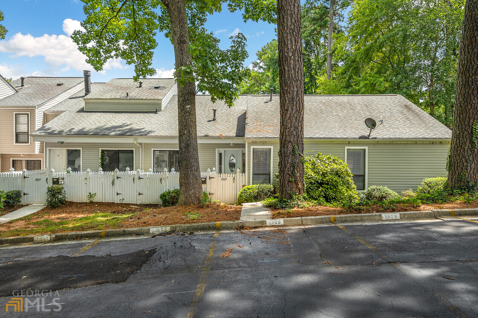 Completely renovated all one level end unit townhome in an amazing Cobb County location! Updated from the top to bottom with beautiful modern touches and fresh paint throughout. This 3 bedroom, 2 bath townhome is a must see. The sunroom is a huge bonus. A wood burning fireplace is the focal point for the dedicated dining and living rooms. Conveniently located w/ close proximity to I-75, 285, the Battery and Cumberland mall areas. HOA maintains exterior.