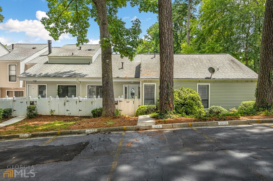 Completely renovated all one level end unit townhome in an amazing Cobb County location! Updated from the top to bottom with beautiful modern touches and fresh paint throughout. This 3 bedroom, 2 bath townhome is a must see. The sunroom is a huge bonus. A wood burning fireplace is the focal point for the dedicated dining and living rooms. Conveniently located w/ close proximity to I-75, 285, the Battery and Cumberland mall areas. HOA maintains exterior.