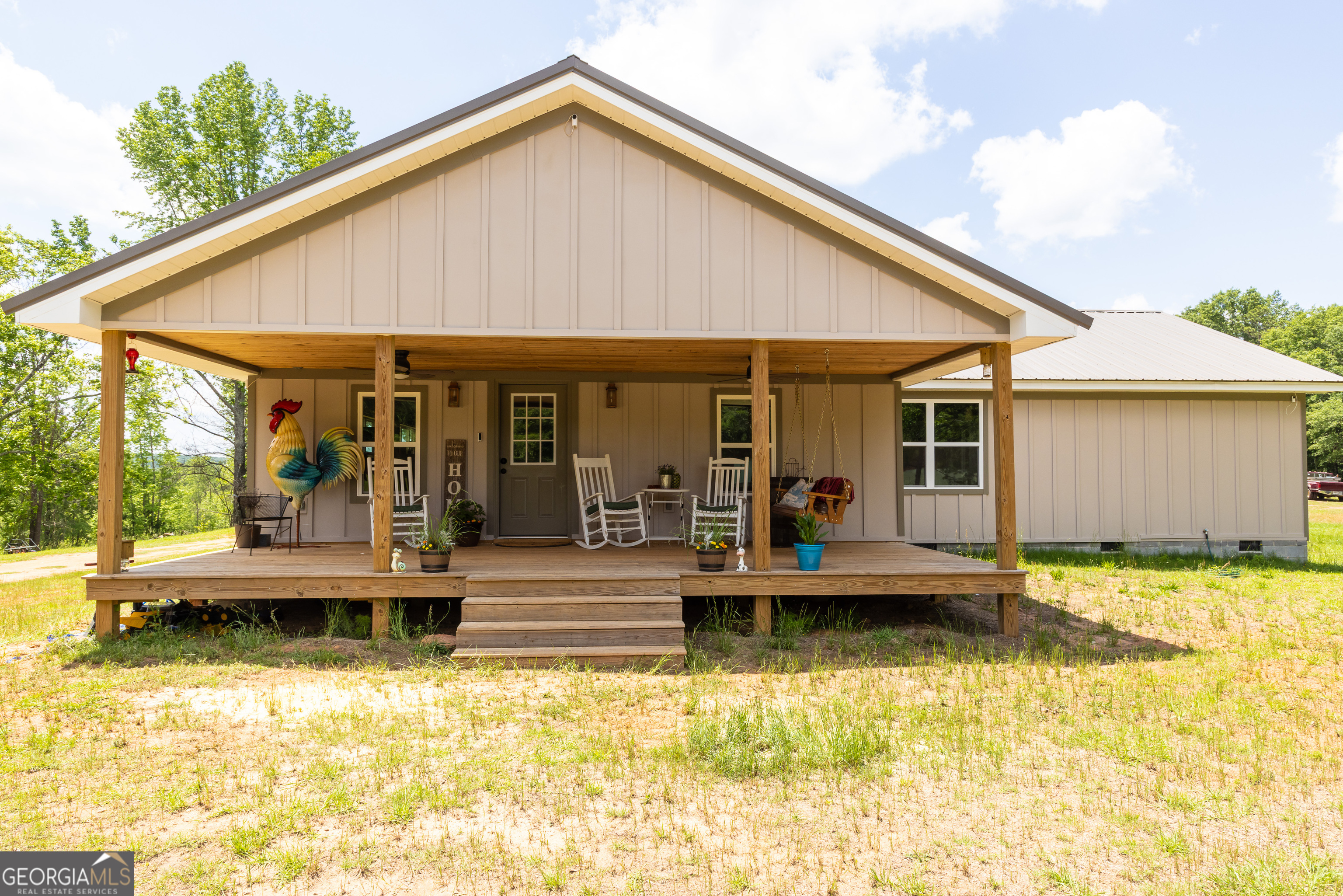 Nestled on a picturesque 5 acres, this charming completely renovated farmhouse radiate both comfort and elegance, making it the perfect escape. Enjoy the true sanctuary of country living with grounds offering wide open spaces, mature trees, and everything you need for a peaceful, country lifestyle. This beautiful custom built ranch with open floor plan is a dream come true! Chef-inspired kitchen with marble countertops, top of the line stainless steel appliances, double oven, pot filler, and two toned soft close custom built cabinetry. Its spacious layout features a cozy bedroom with spa like bathroom and large his and hers closet, open concept family room, large mud room, laundry room, and space for additional bedroom or custom pantry. Don't miss the opportunity to make your dream home and property a reality.